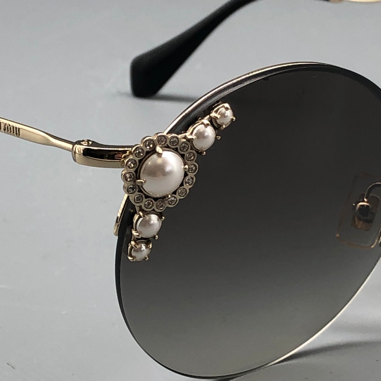 Miu Miu Round Pearl Embellished Sunglasses