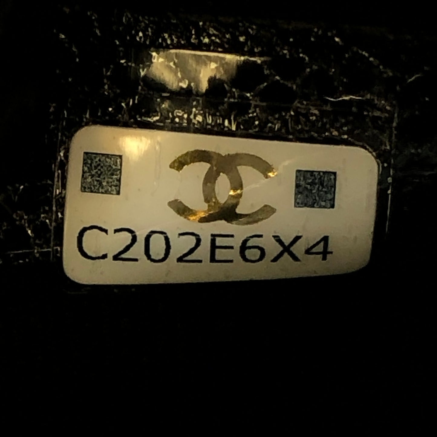 Chanel Foldable Tote Bag with Chain Quilted Caviar and Printed Nylon.