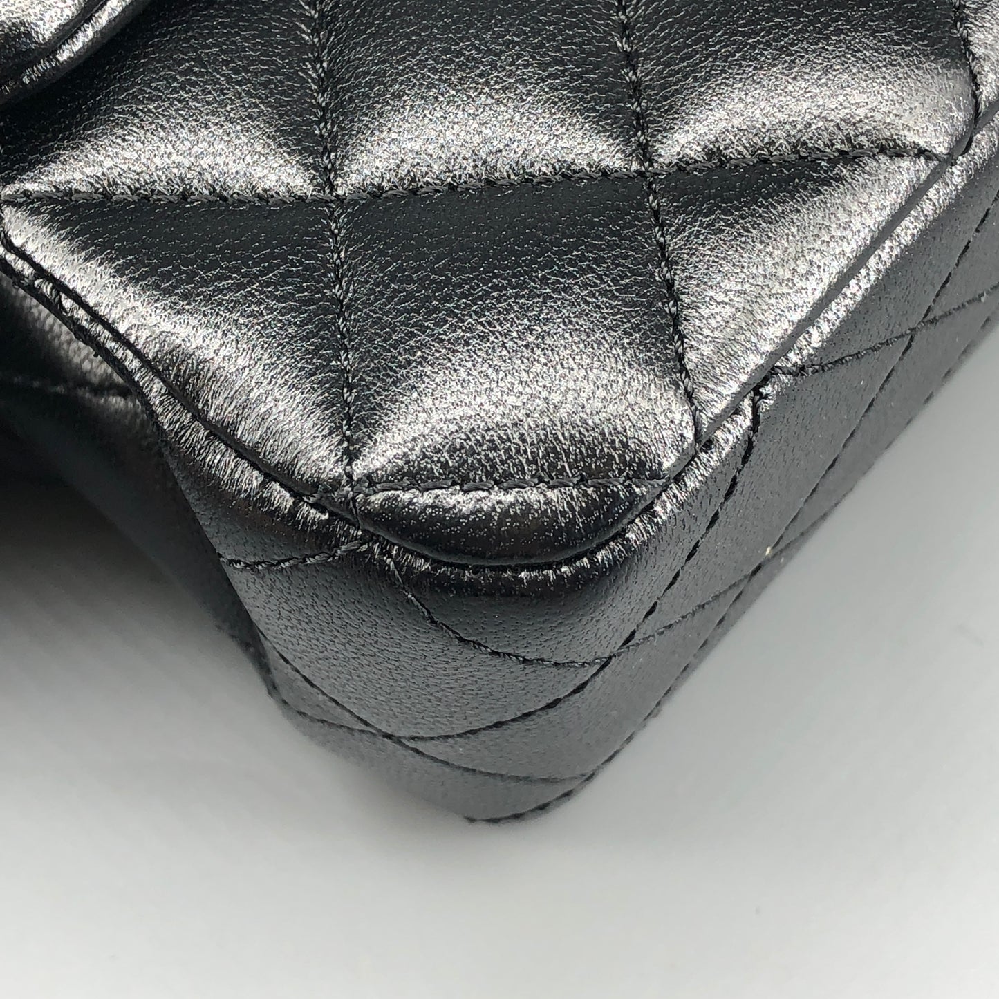 Chanel lambskin quilted mini rectangular flap bag in black with CC logo chain