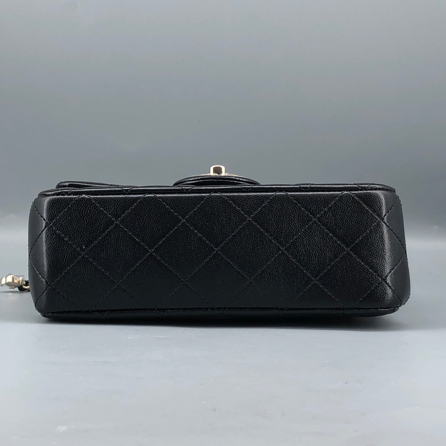 Chanel lambskin quilted mini rectangular flap bag in black with CC logo chain
