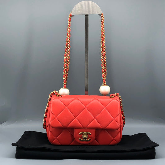 Chanel Mini Quilted Lambskin Flap Bag with Pearl Chain Red