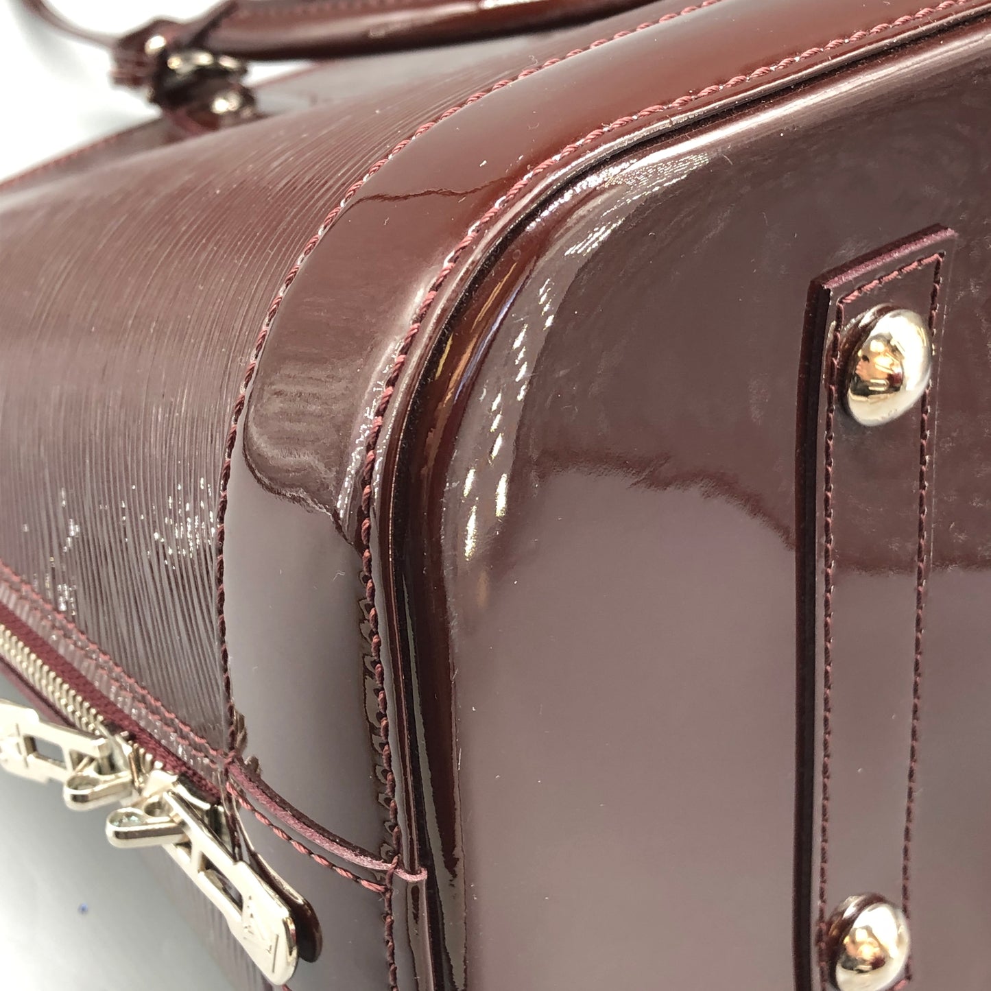 Louis Vuitton Alma Epi Electric Burgundy Brown Handbag