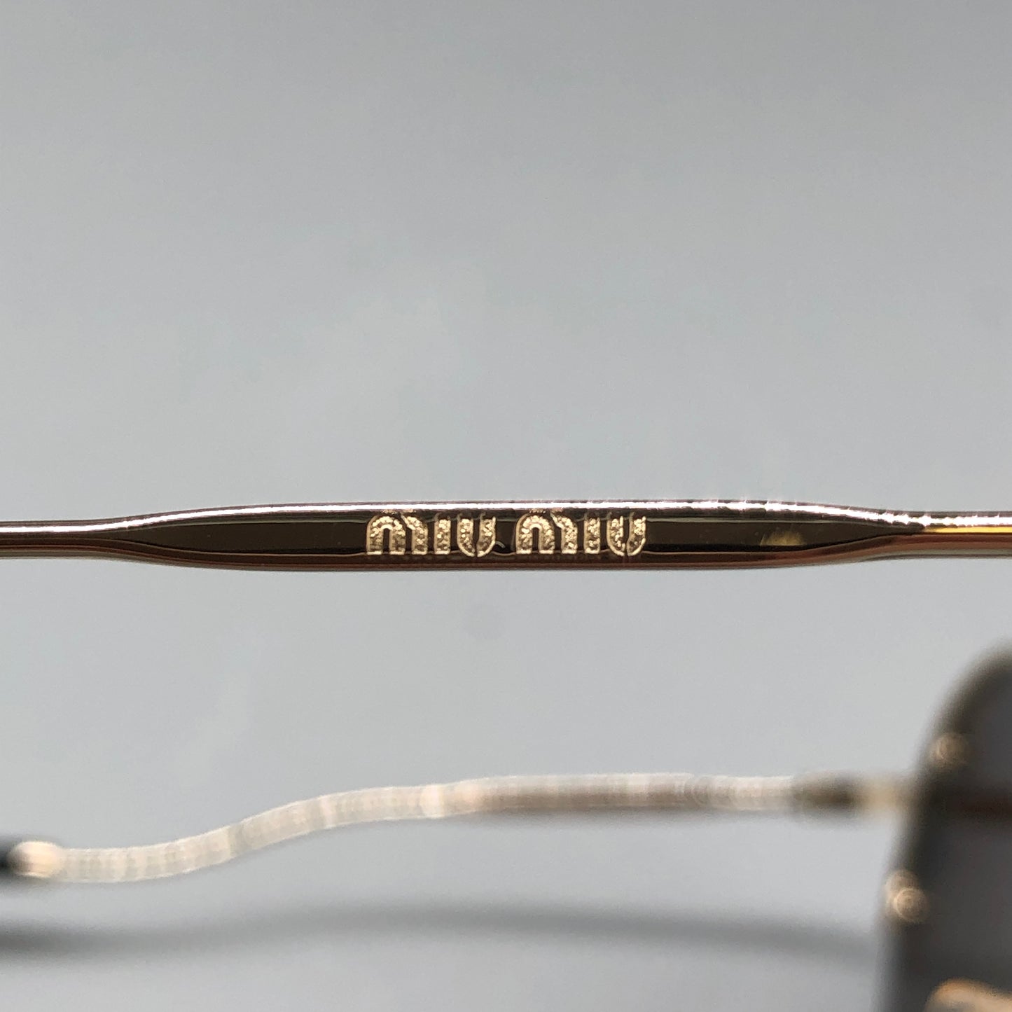 Miu Miu Round Pearl Embellished Sunglasses