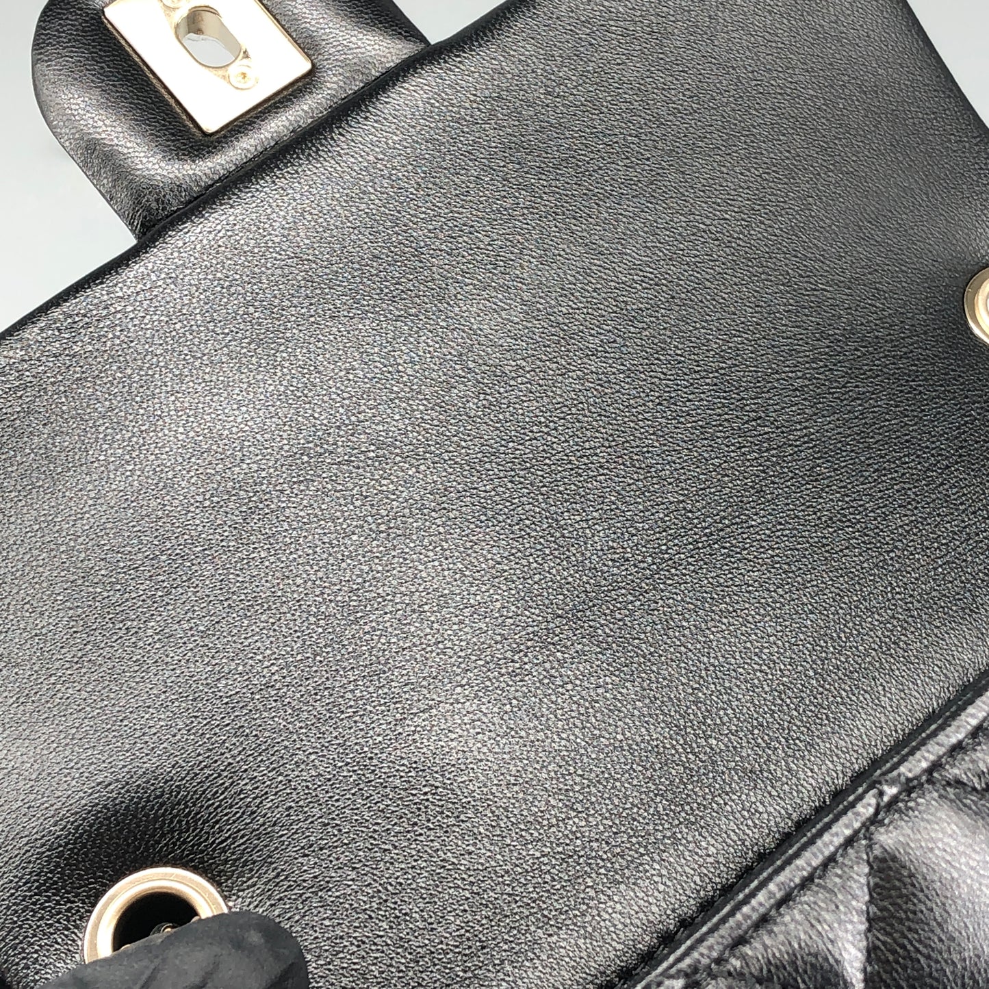 Chanel lambskin quilted mini rectangular flap bag in black with CC logo chain