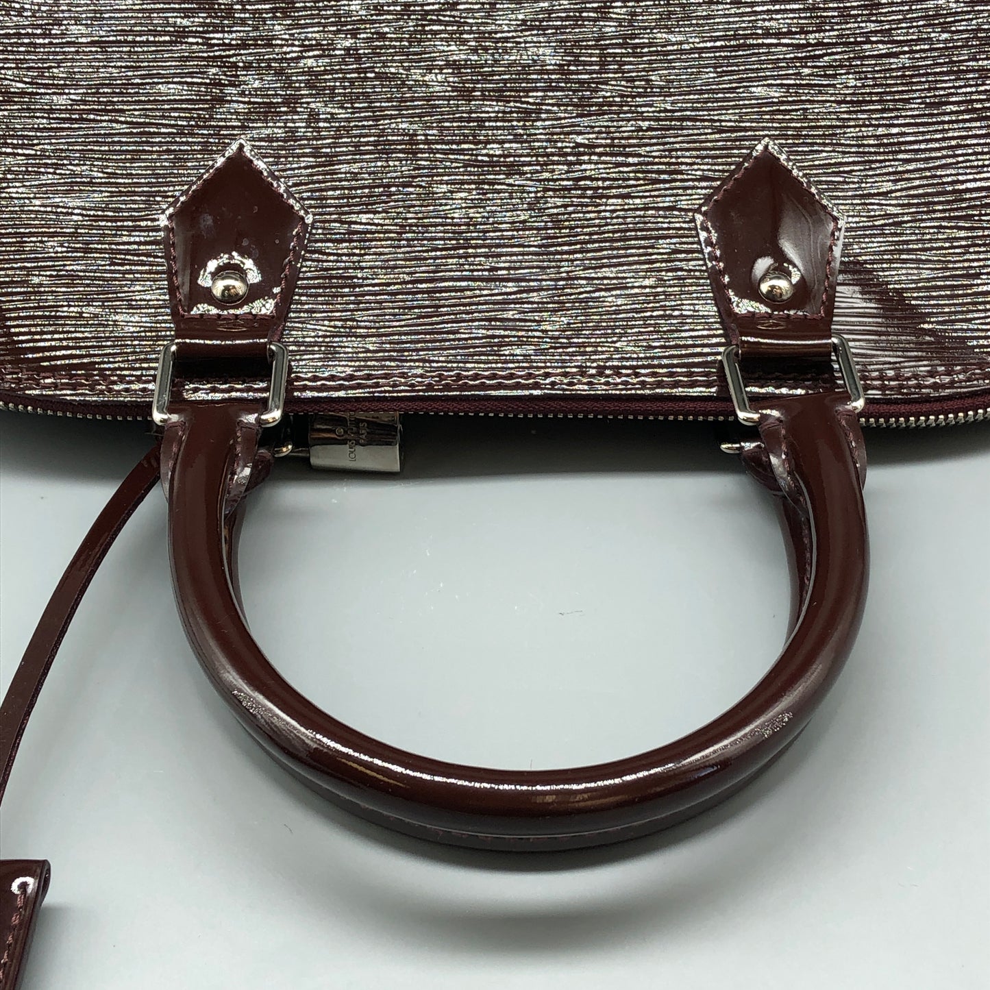 Louis Vuitton Alma Epi Electric Burgundy Brown Handbag