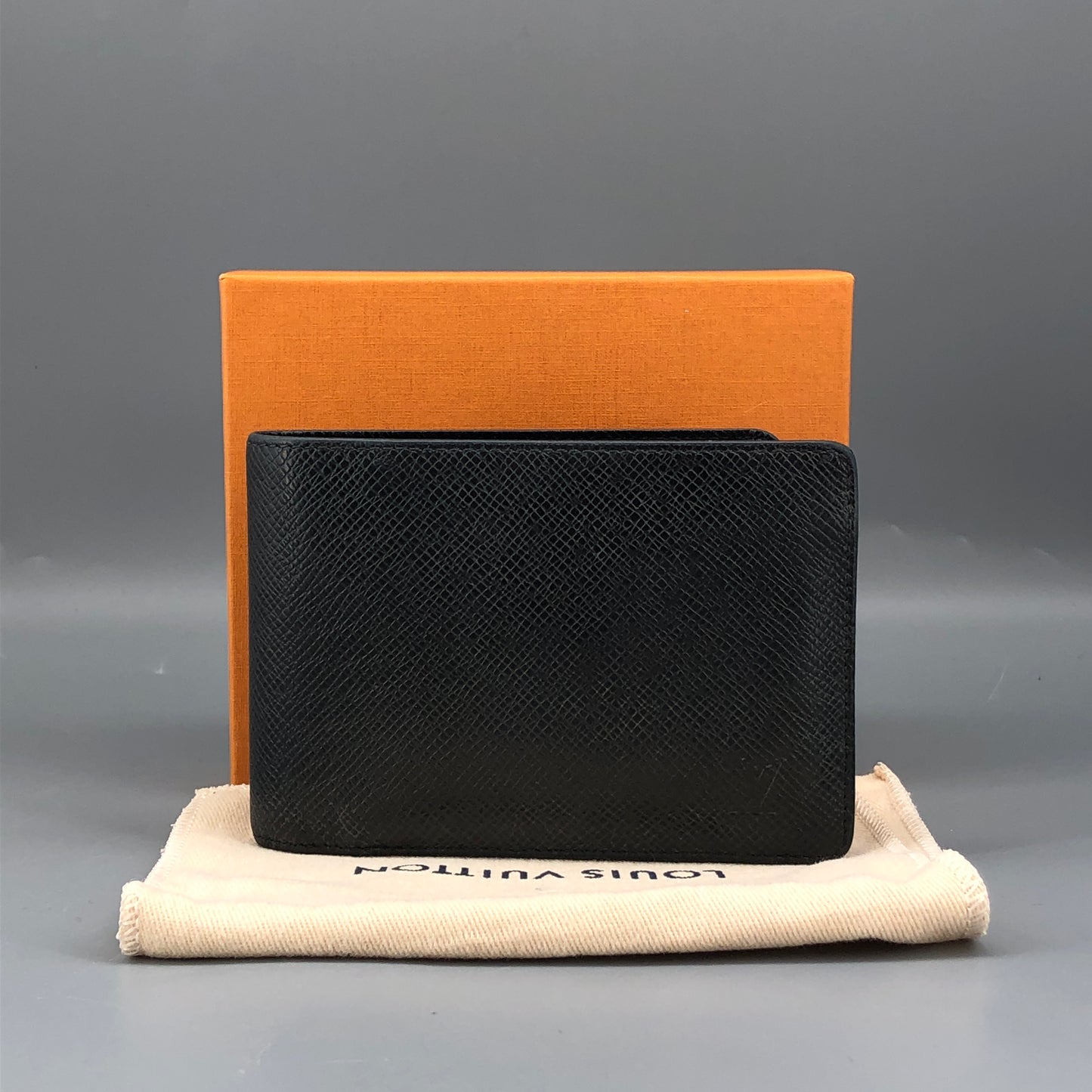 Louis Vuitton Taiga Leather Bifold Wallet Black