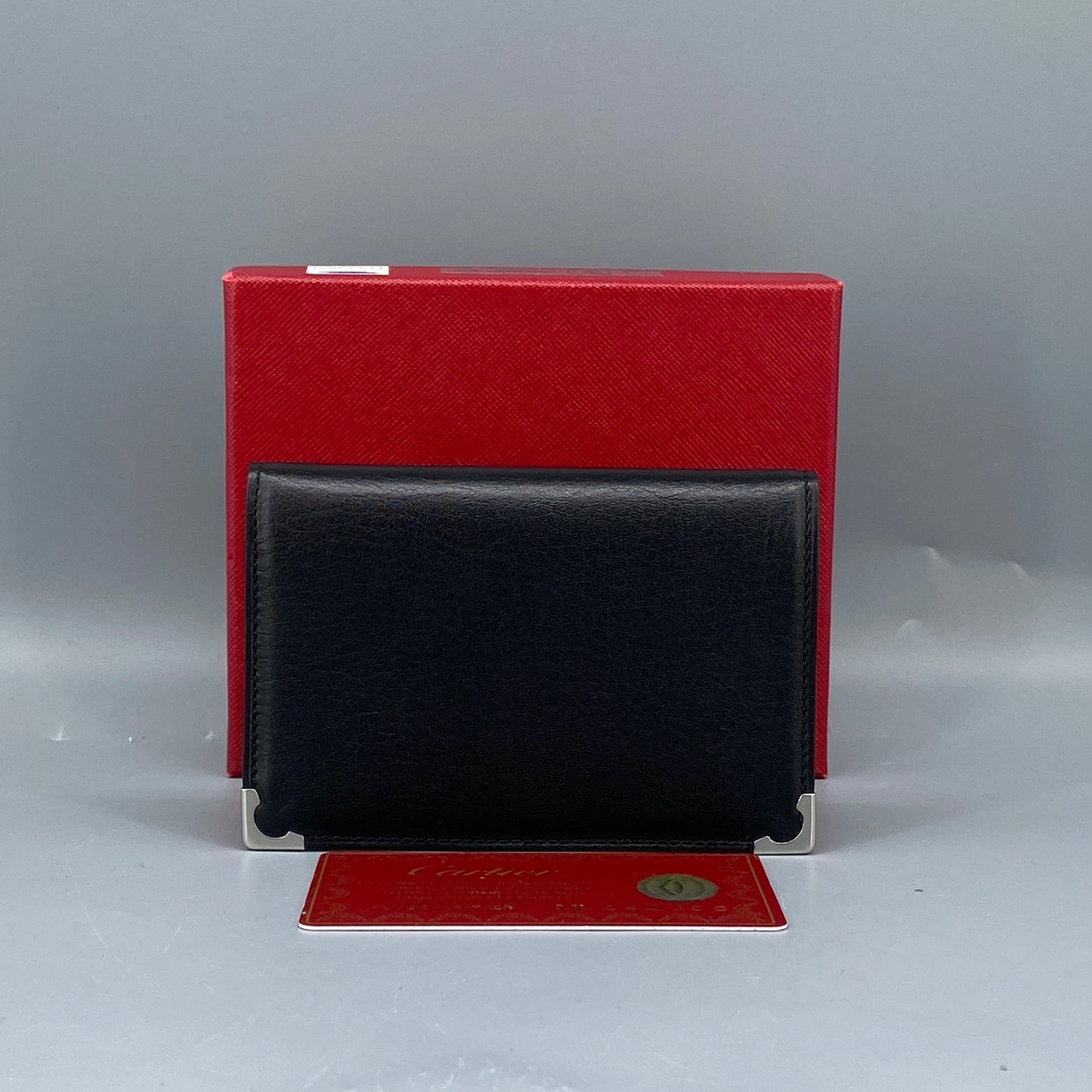 Cartier Black Smooth Leather Bi-fold Wallet with Metal Corner Guards