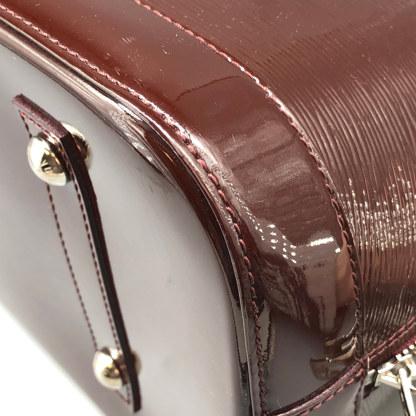 Louis Vuitton Alma Epi Electric Burgundy Brown Handbag