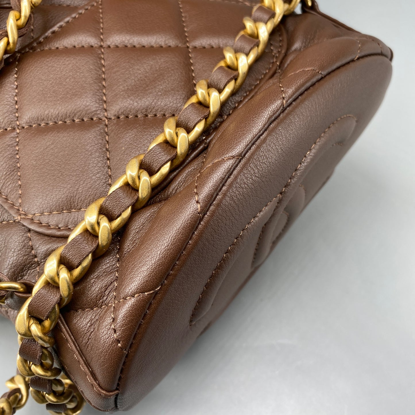 Chanel 23A Deep Brown Quilted Leather Mini Bucket Bag