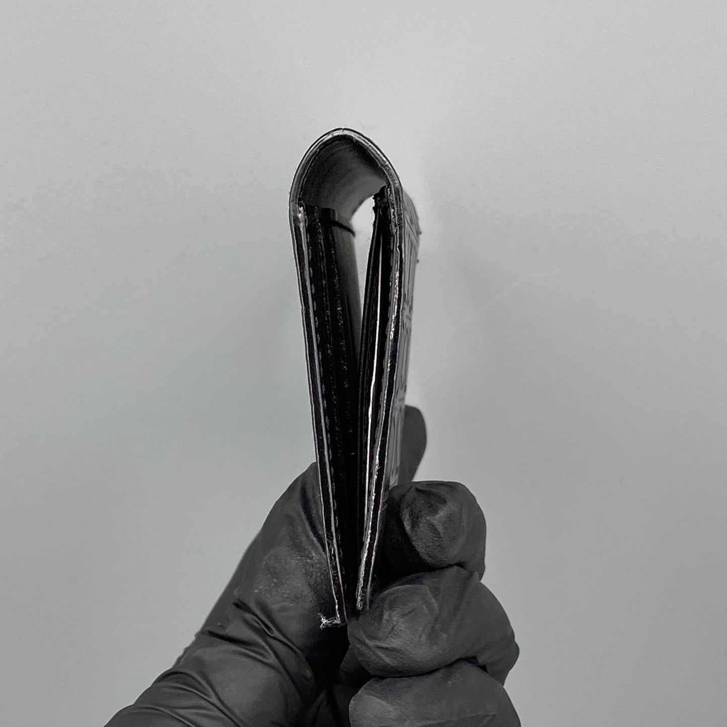 Ferragamo Black Embossed Gancini Bi-fold Card Wallet