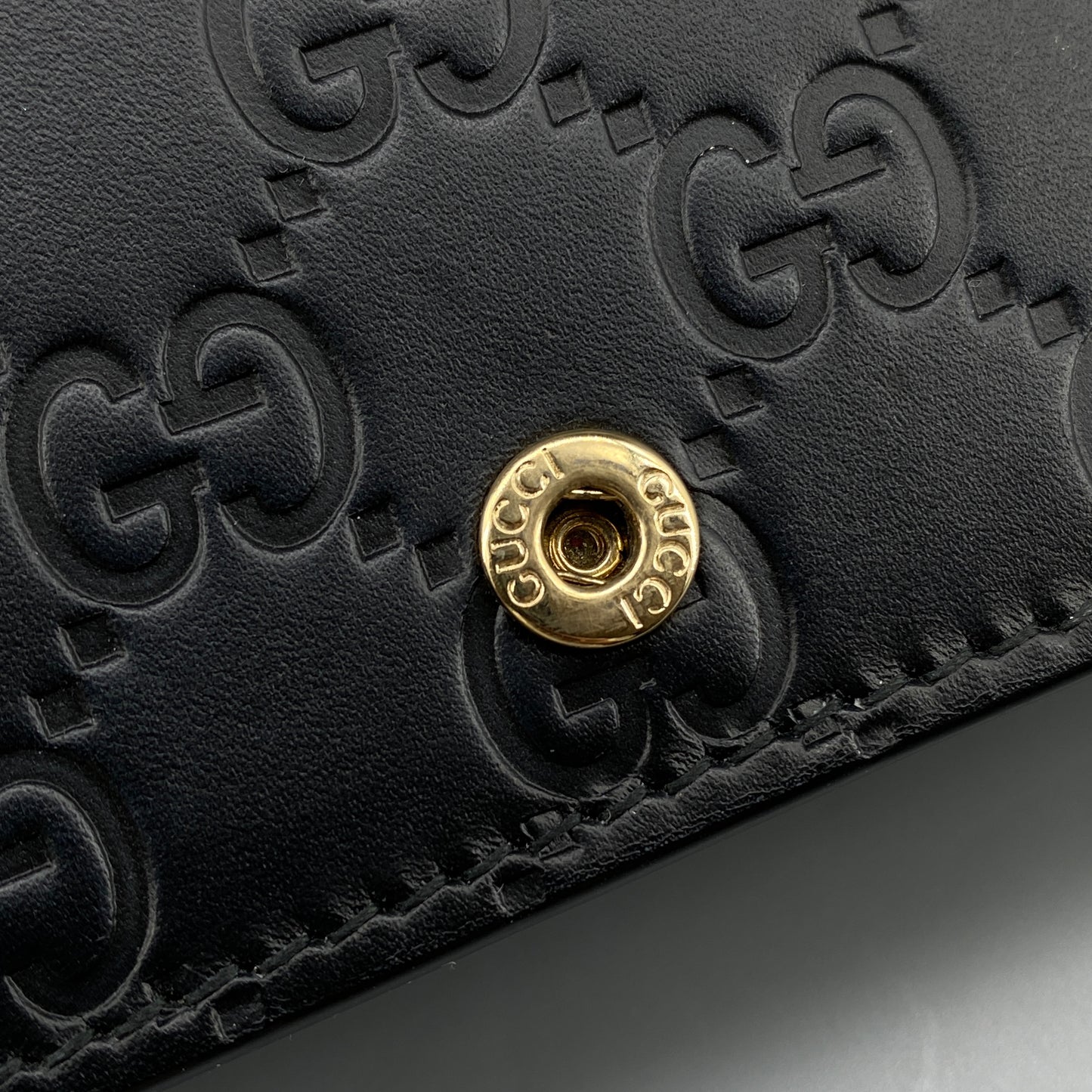Gucci Black GG Embossed Chain Wallet Bag