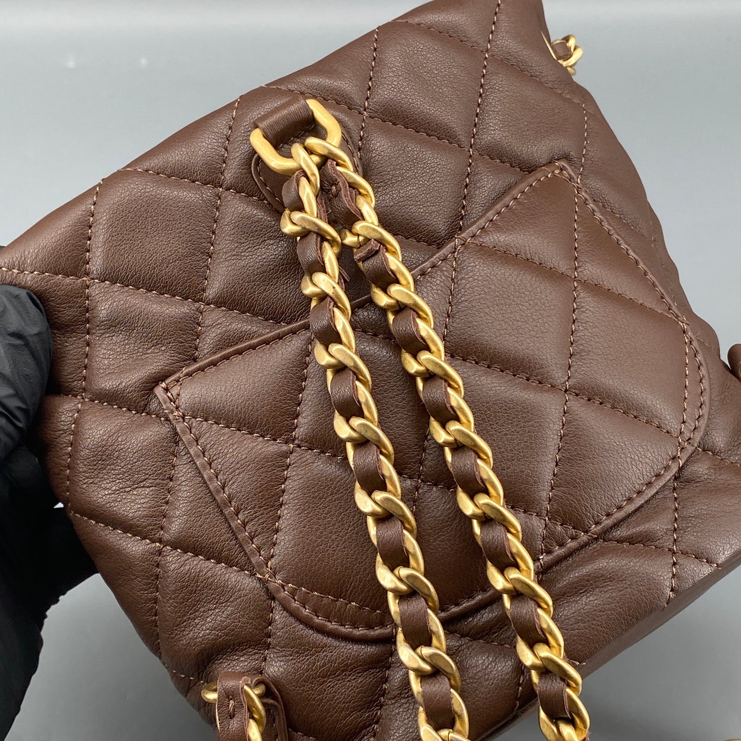 Chanel 23A Deep Brown Quilted Leather Mini Bucket Bag