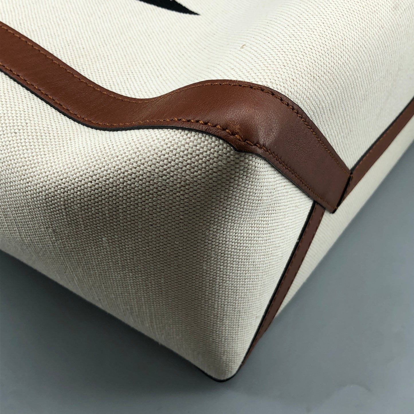 Valentino Garavani VLTN Grande Plage tote features canvas Cream/Caramel