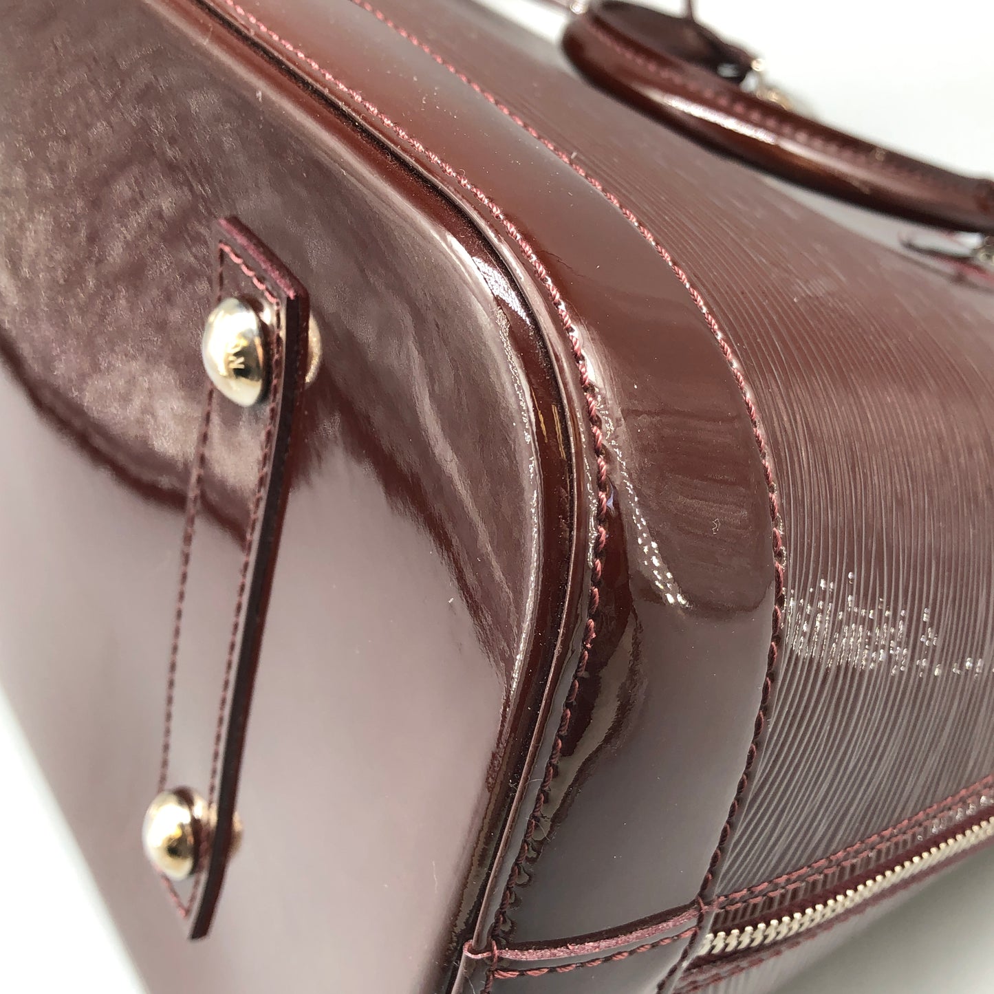 Louis Vuitton Alma Epi Electric Burgundy Brown Handbag