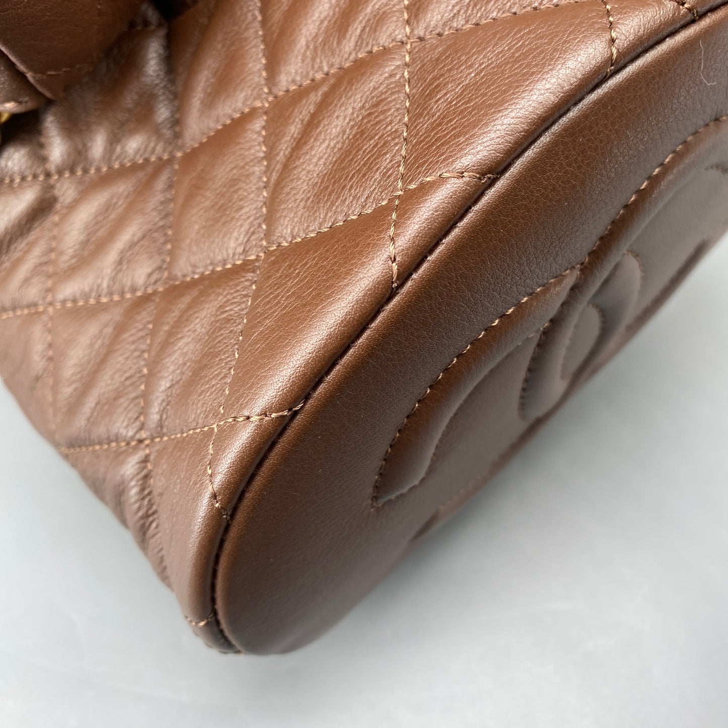 Chanel 23A Deep Brown Quilted Leather Mini Bucket Bag