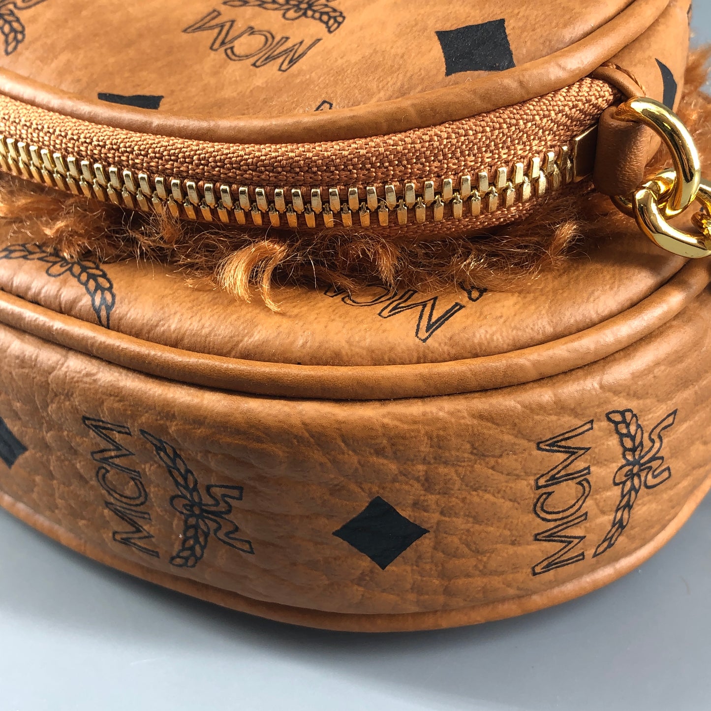 MCM Visetos Shearling Trim Oval Crossbody Camera Bag  Caramel
