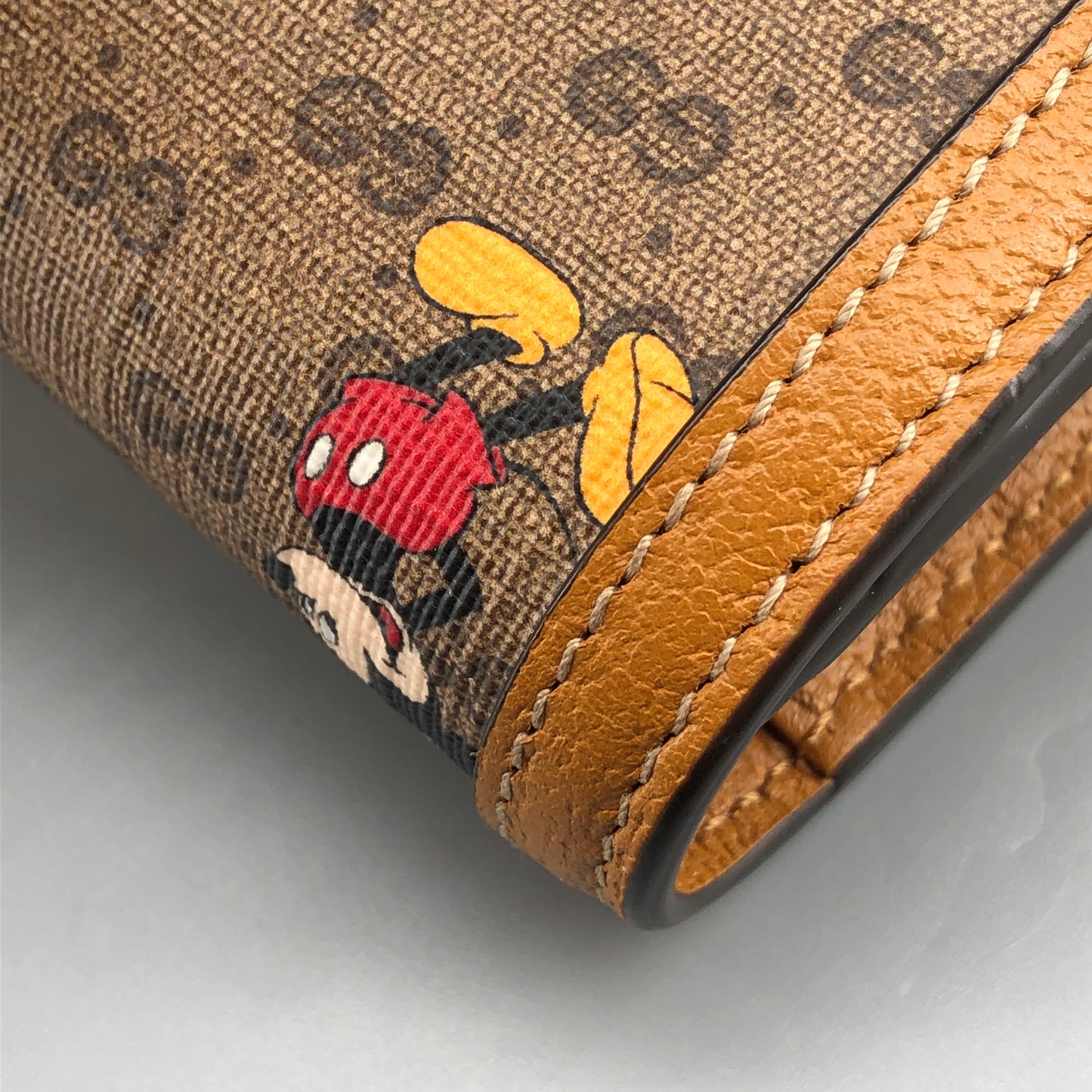 Gucci x Disney Mickey GG Supreme Flap Long Wallet yellow/beige