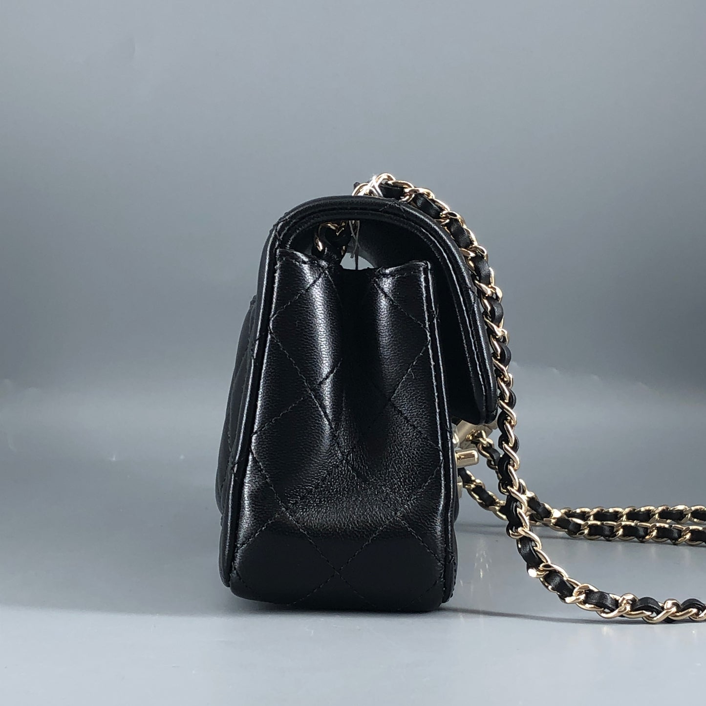 Chanel lambskin quilted mini rectangular flap bag in black with CC logo chain