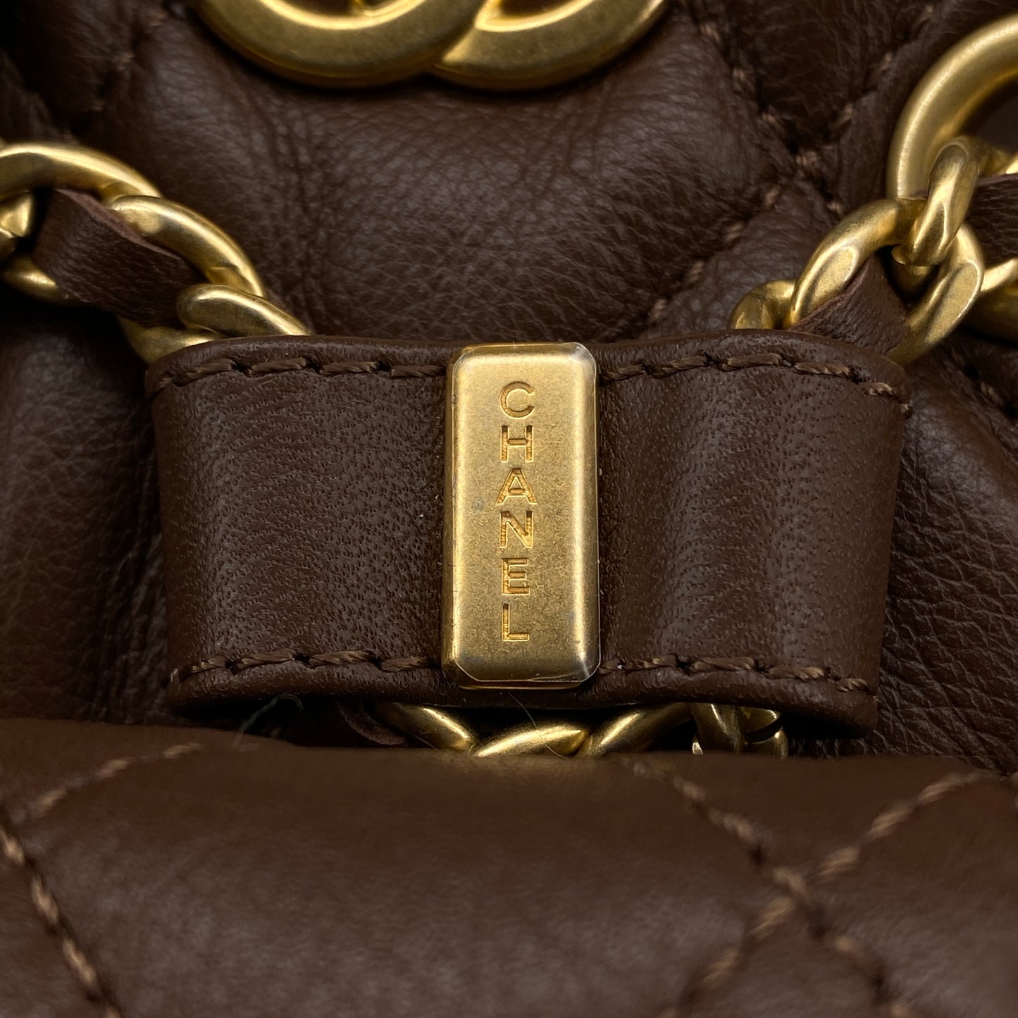 Chanel 23A Deep Brown Quilted Leather Mini Bucket Bag