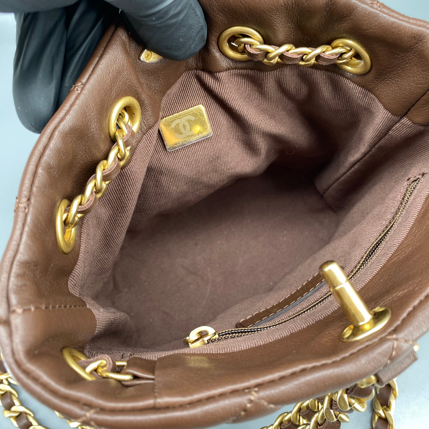 Chanel 23A Deep Brown Quilted Leather Mini Bucket Bag