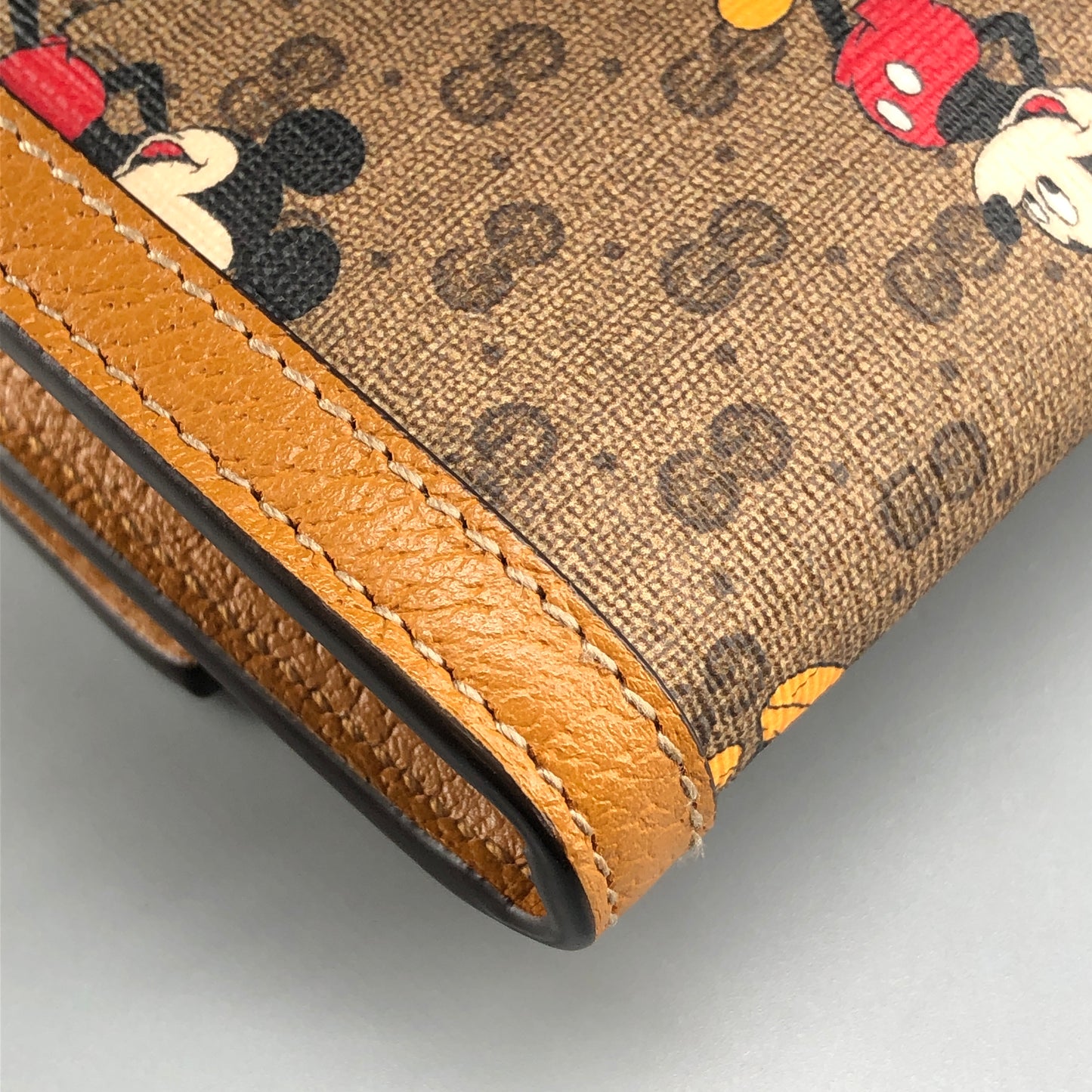 Gucci x Disney Mickey GG Supreme Flap Long Wallet yellow/beige