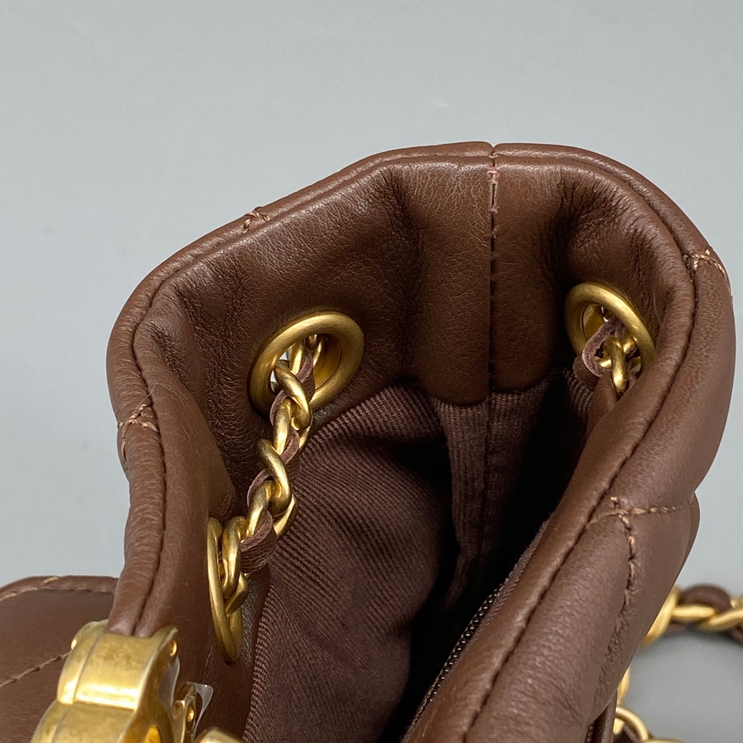Chanel 23A Deep Brown Quilted Leather Mini Bucket Bag