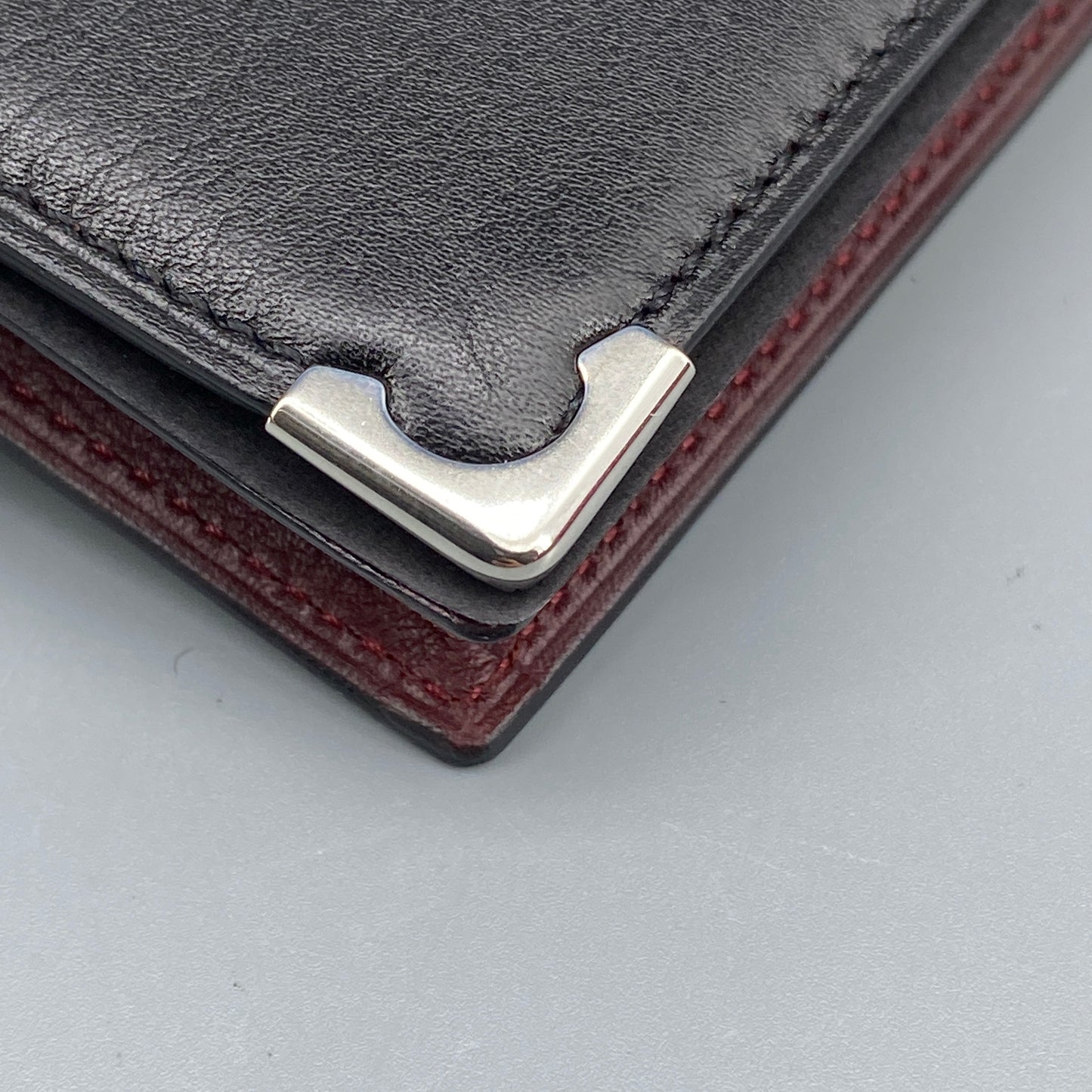 Cartier Black Smooth Leather Bi-fold Wallet with Metal Corner Guards