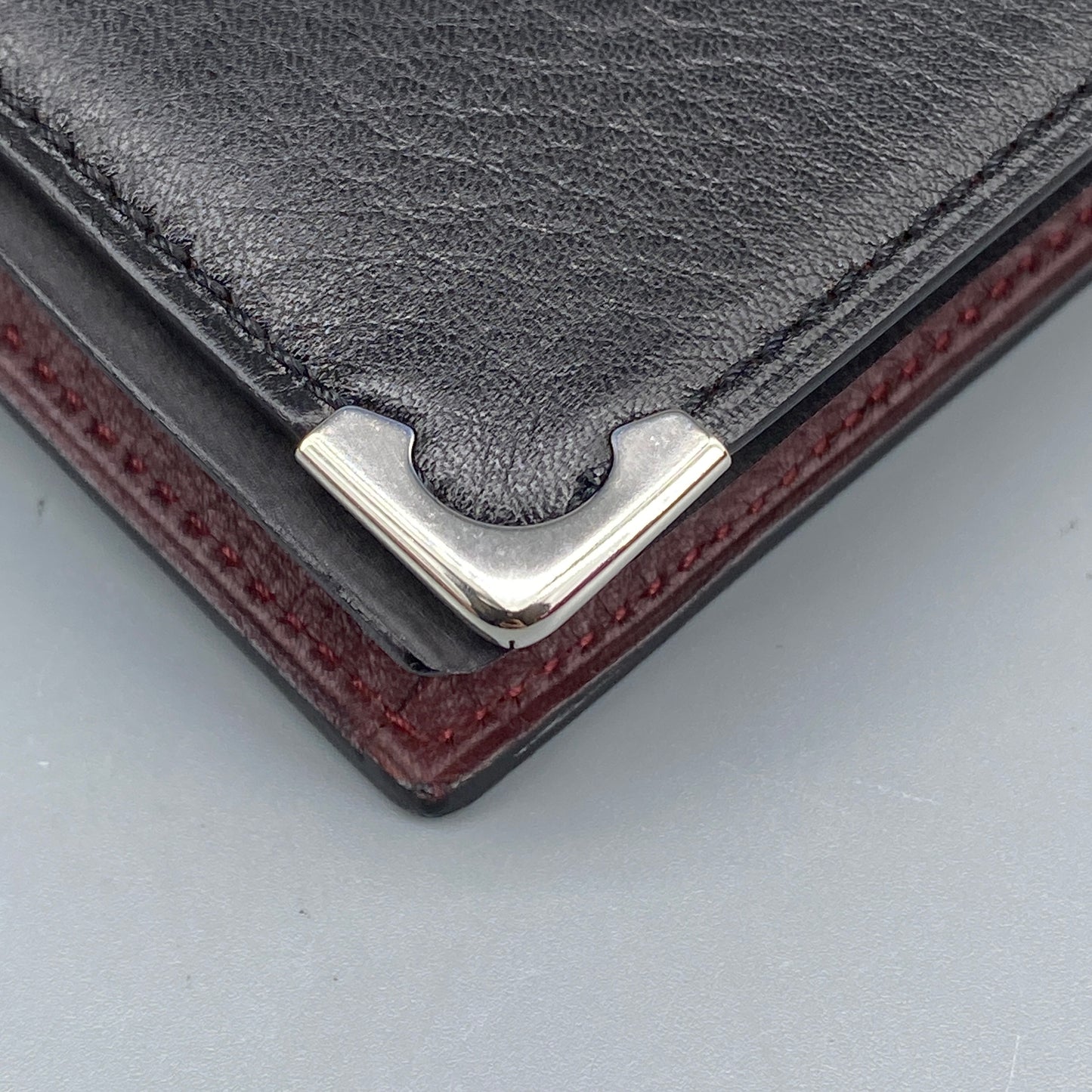Cartier Black Smooth Leather Bi-fold Wallet with Metal Corner Guards