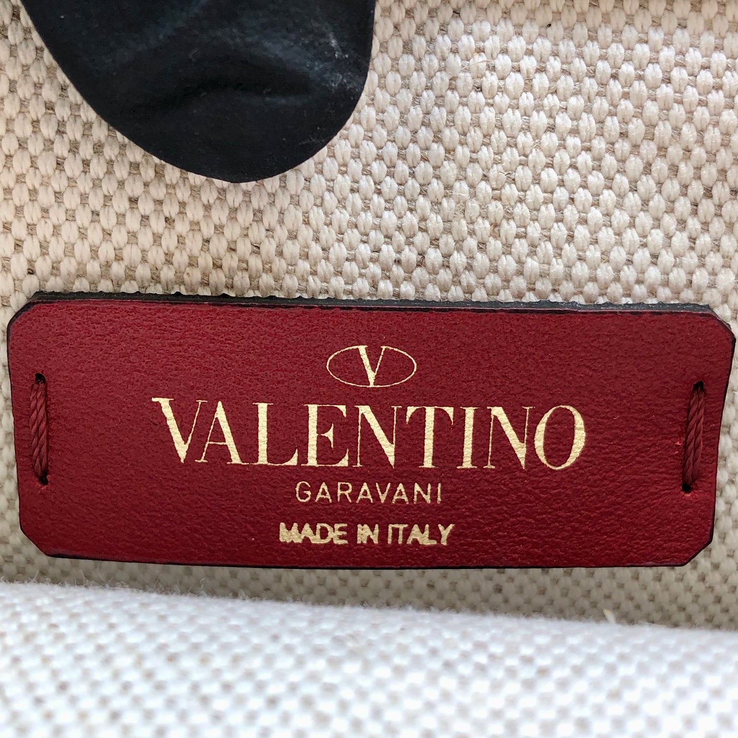 Valentino Garavani VLTN Grande Plage tote features canvas Cream/Caramel