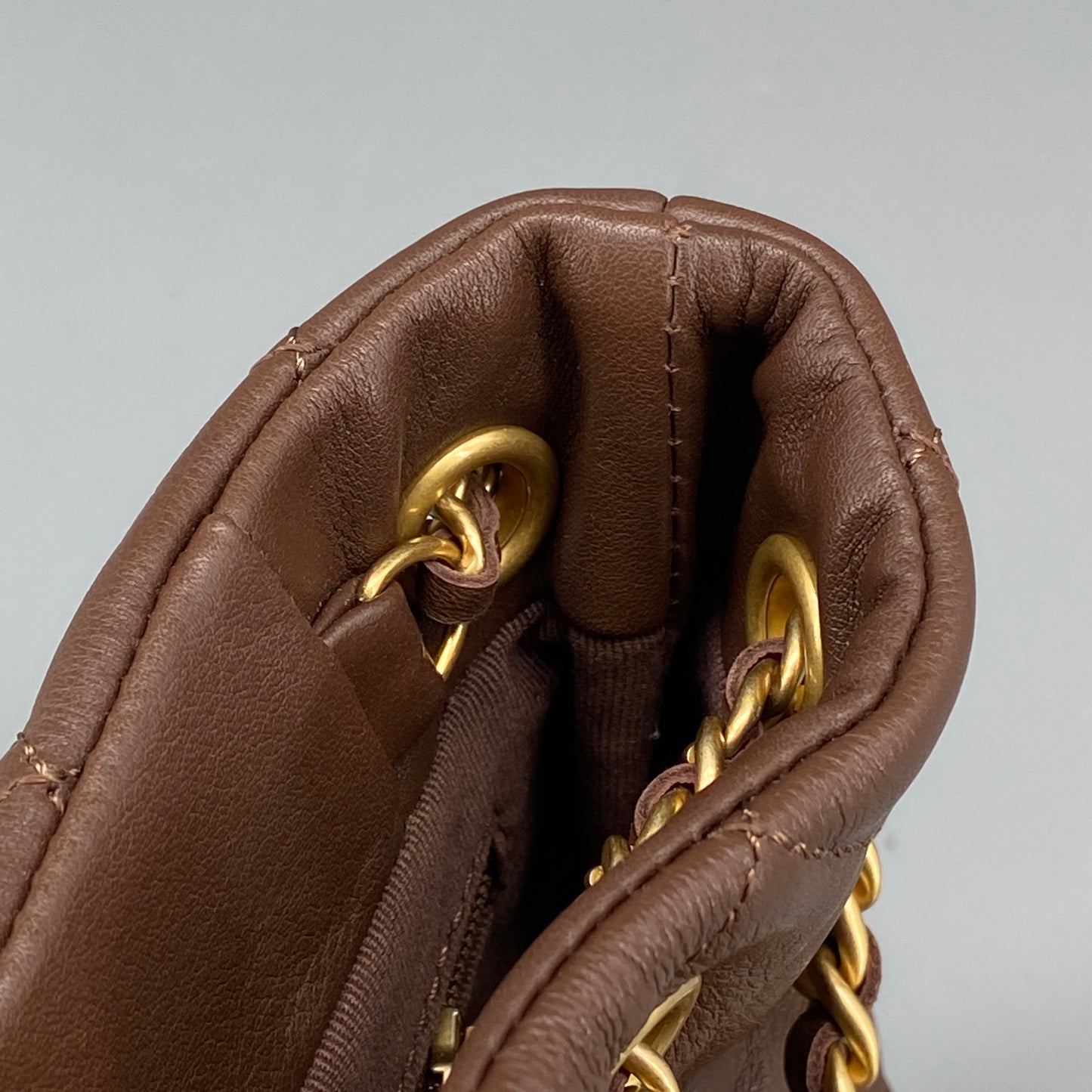 Chanel 23A Deep Brown Quilted Leather Mini Bucket Bag