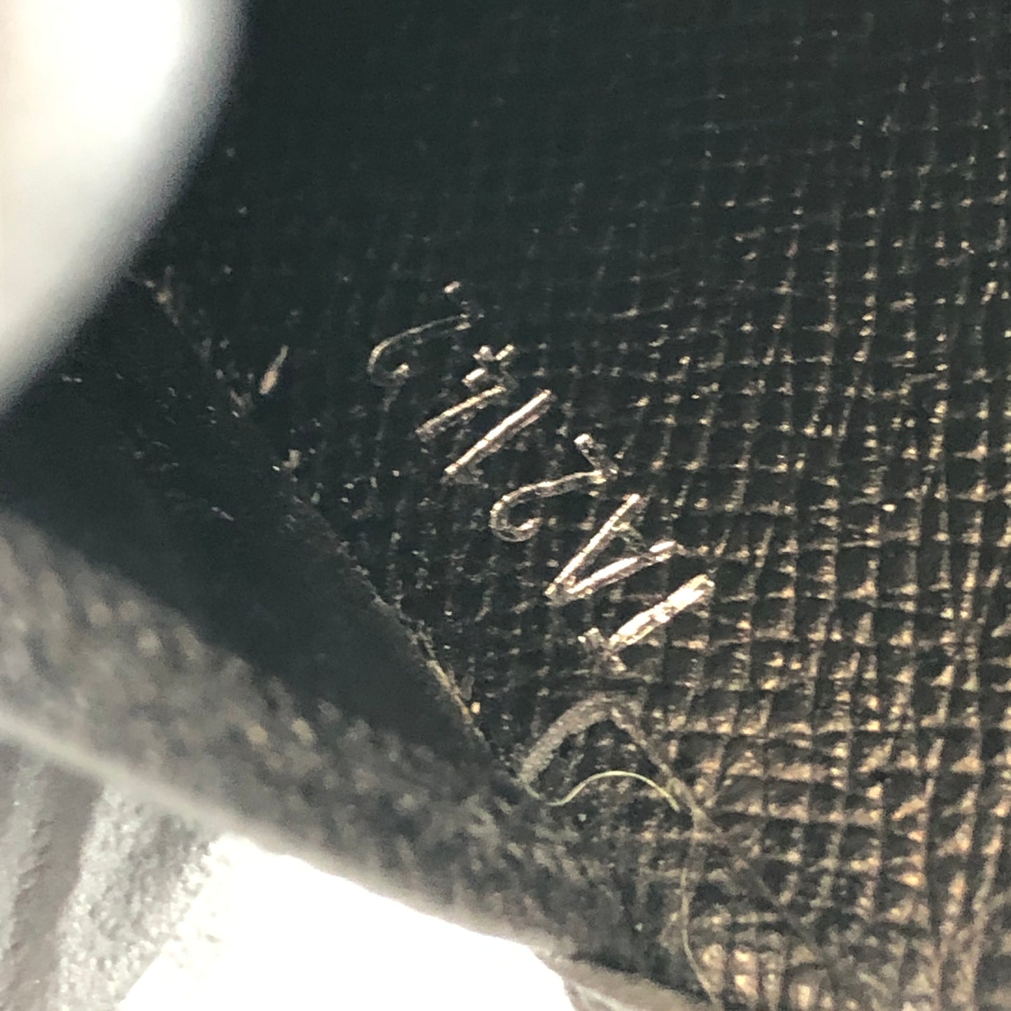 Louis Vuitton Taiga Leather Bifold Wallet Black