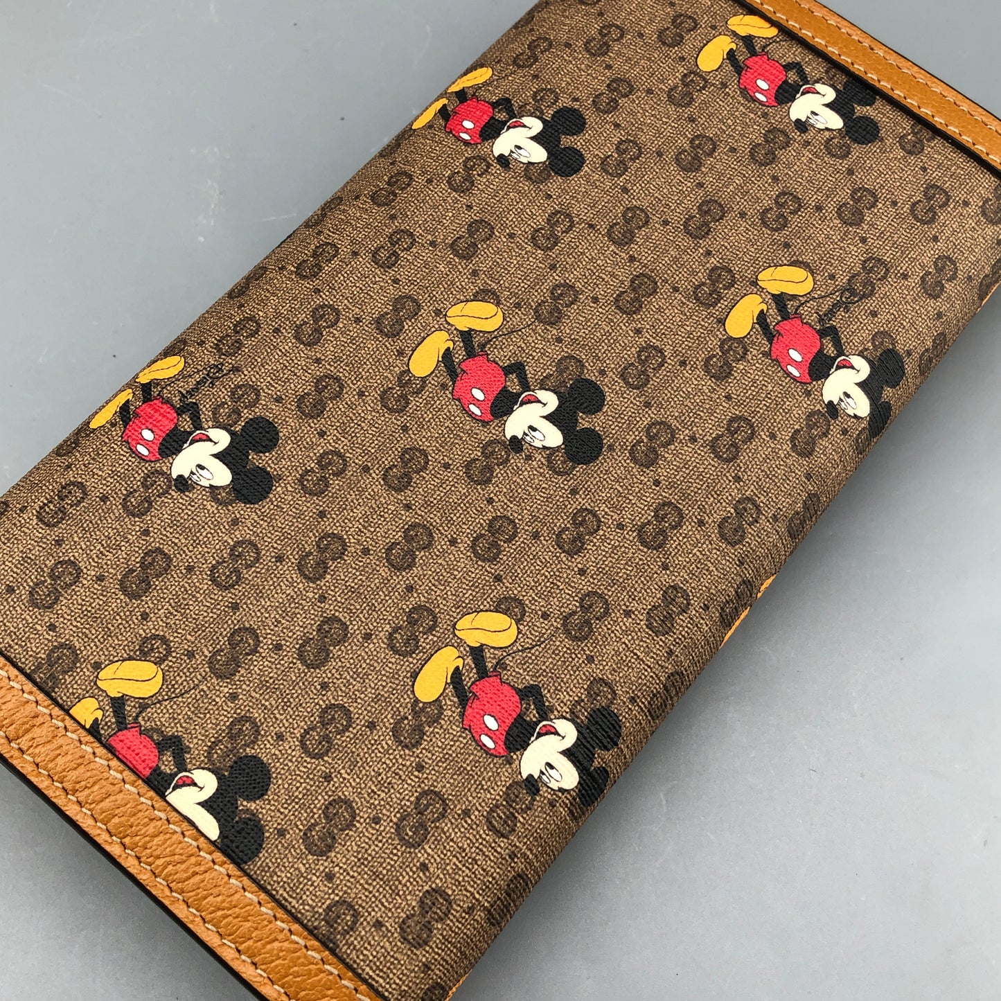 Gucci x Disney Mickey GG Supreme Flap Long Wallet yellow/beige