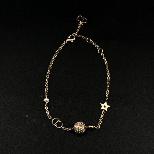 Christian Dior Gold Tone Crystal & Star Charm Bracelet