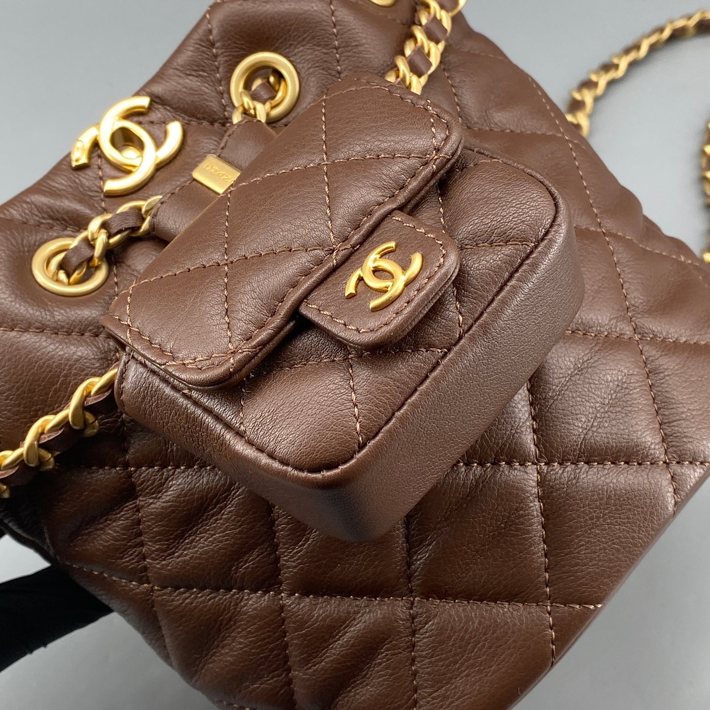 Chanel 23A Deep Brown Quilted Leather Mini Bucket Bag