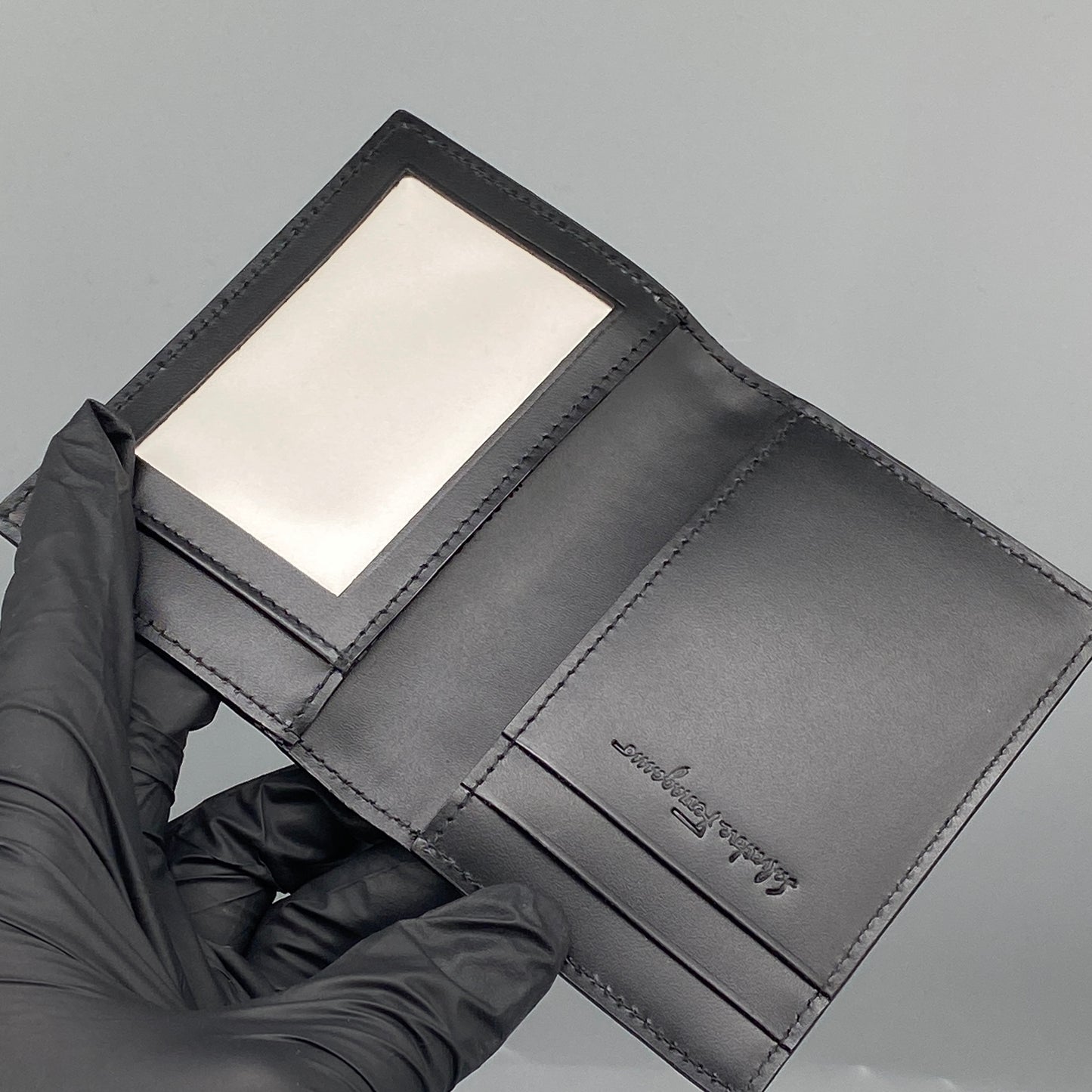 Ferragamo Black Embossed Gancini Bi-fold Card Wallet