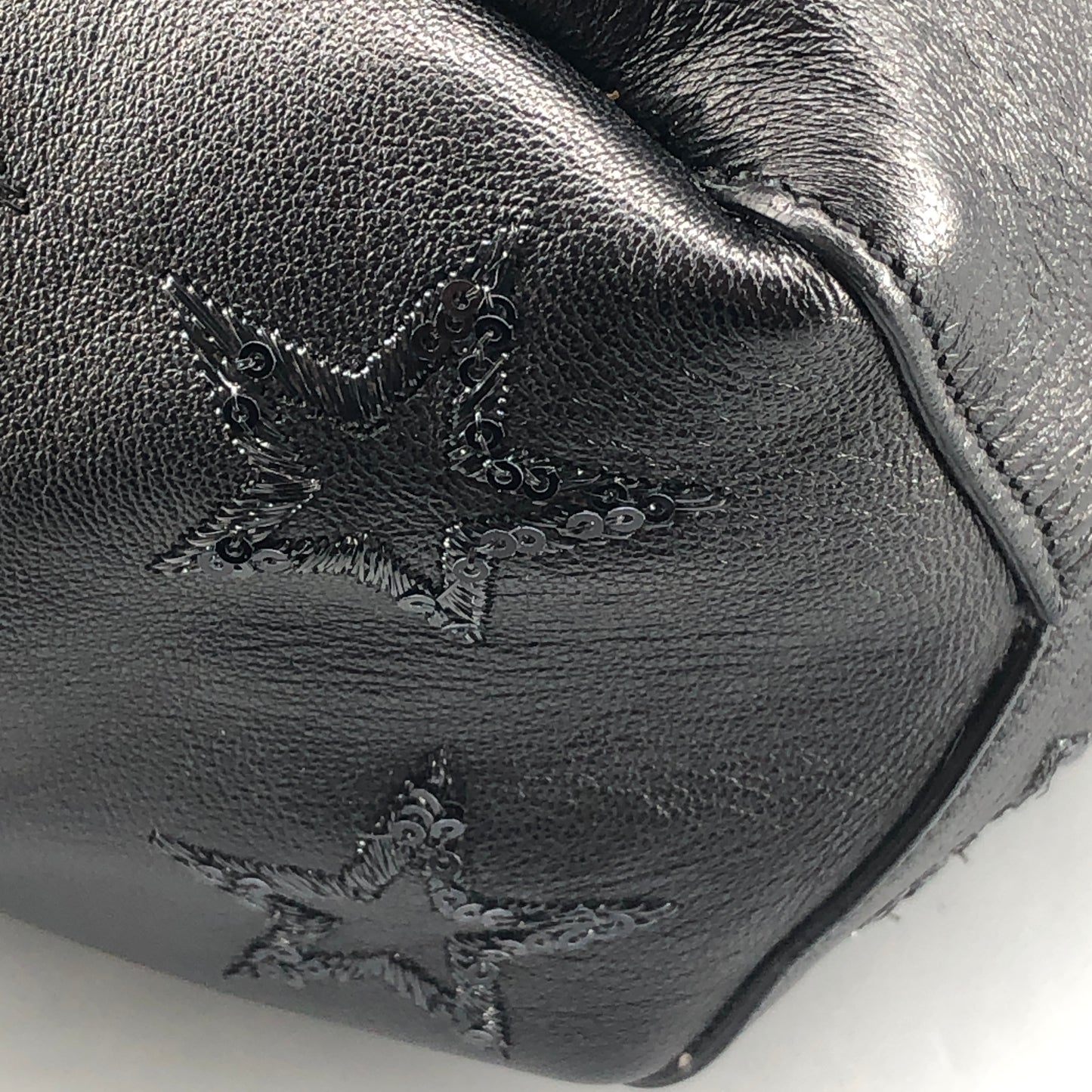Saint Laurent Star Embossed Leather Mini Drawstring Bucket Bag Black