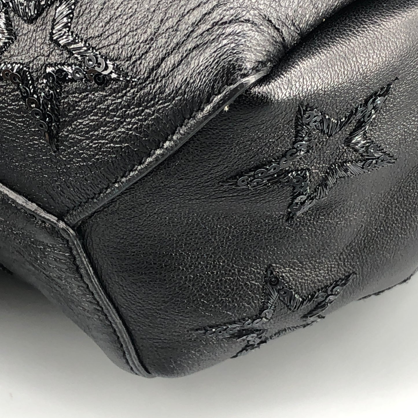 Saint Laurent Star Embossed Leather Mini Drawstring Bucket Bag Black