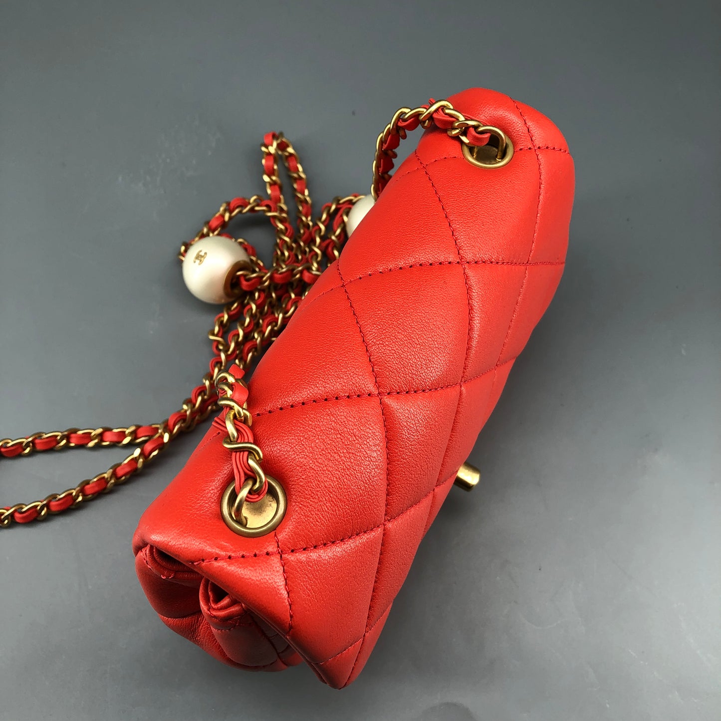 Chanel Mini Quilted Lambskin Flap Bag with Pearl Chain Red