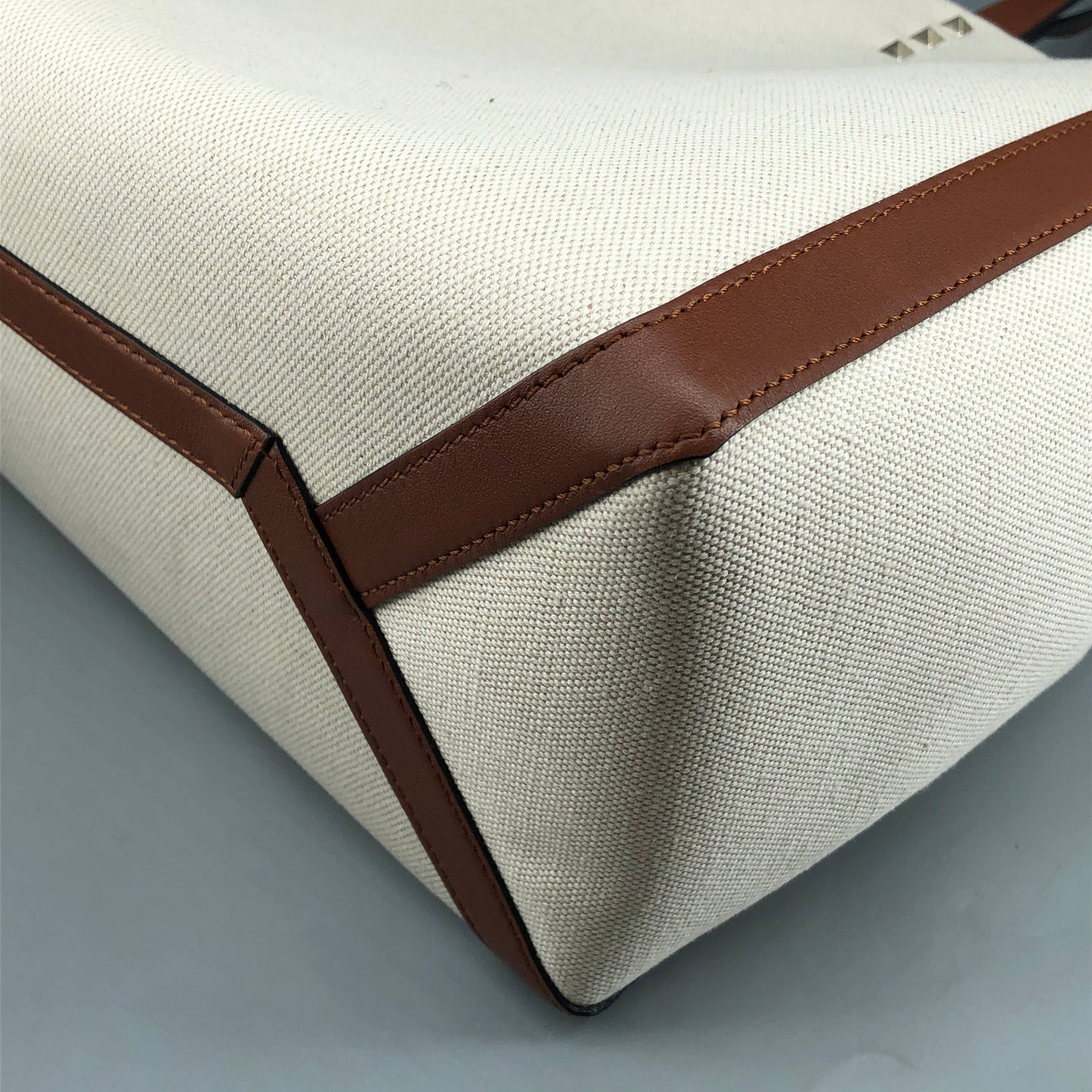 Valentino Garavani VLTN Grande Plage tote features canvas Cream/Caramel