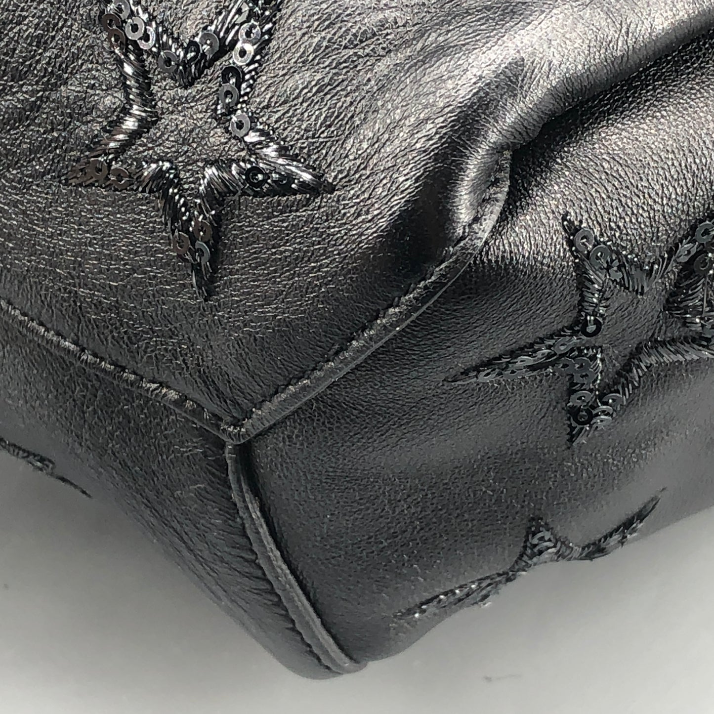 Saint Laurent Star Embossed Leather Mini Drawstring Bucket Bag Black