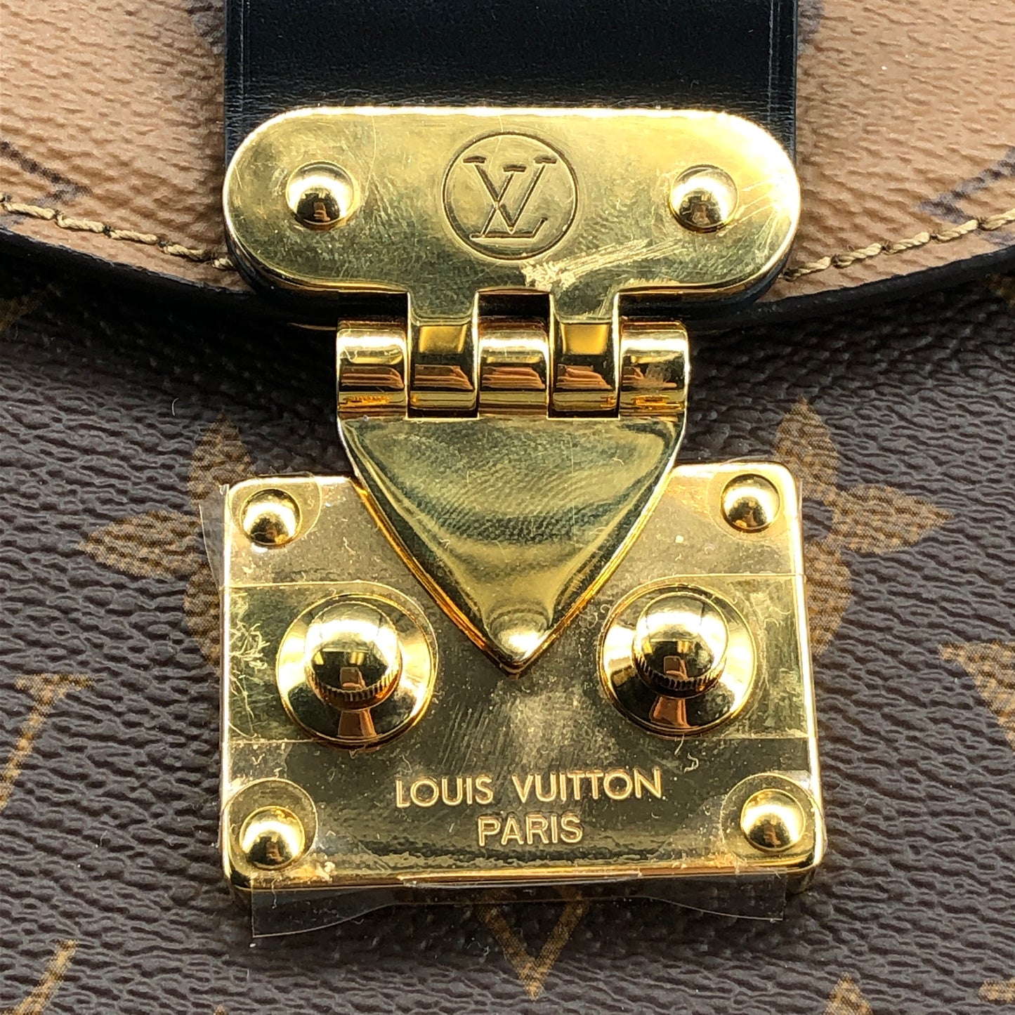Louis Vuitton Monogram Reverse Tilsitt Bag Brown