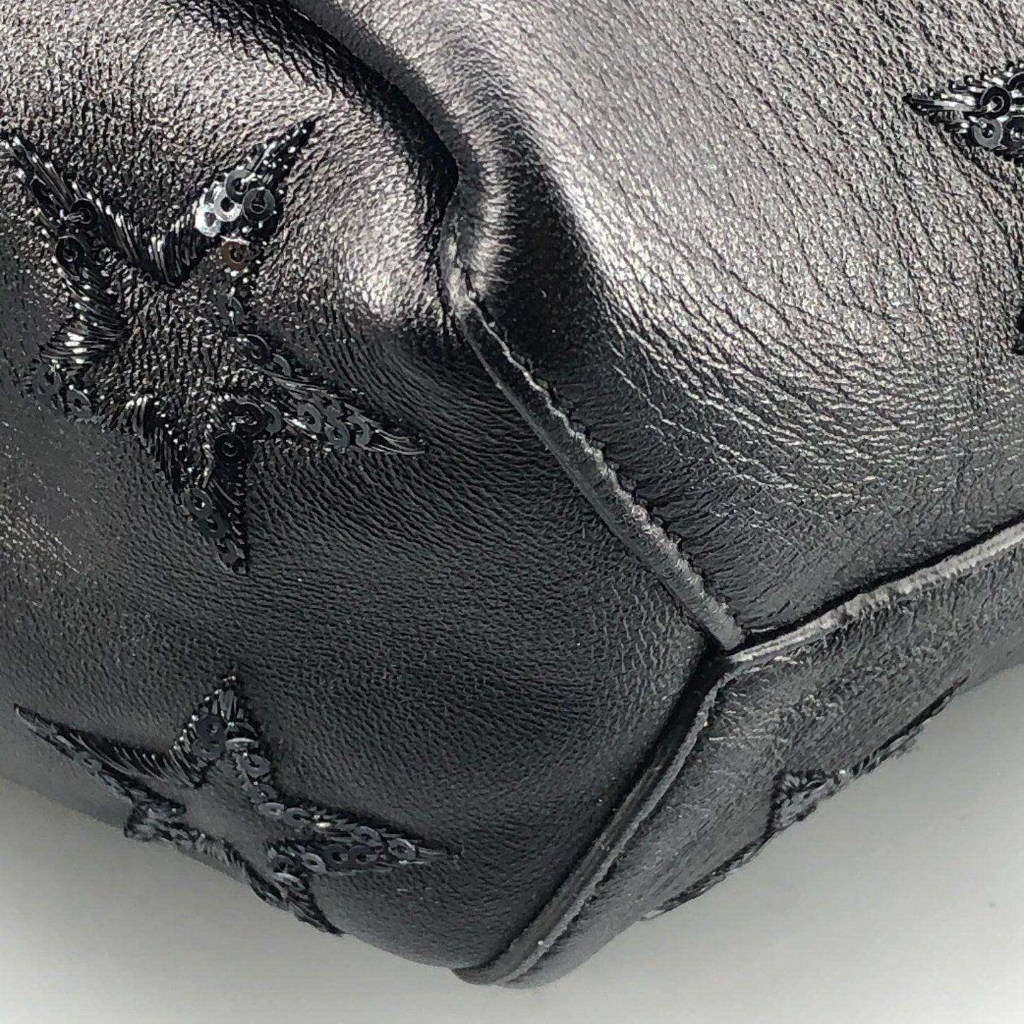 Saint Laurent Star Embossed Leather Mini Drawstring Bucket Bag Black