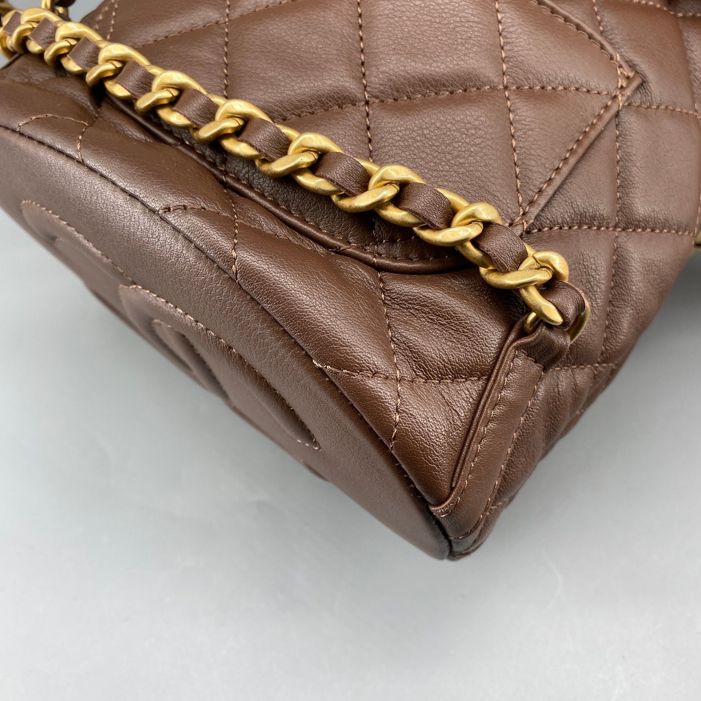 Chanel 23A Deep Brown Quilted Leather Mini Bucket Bag