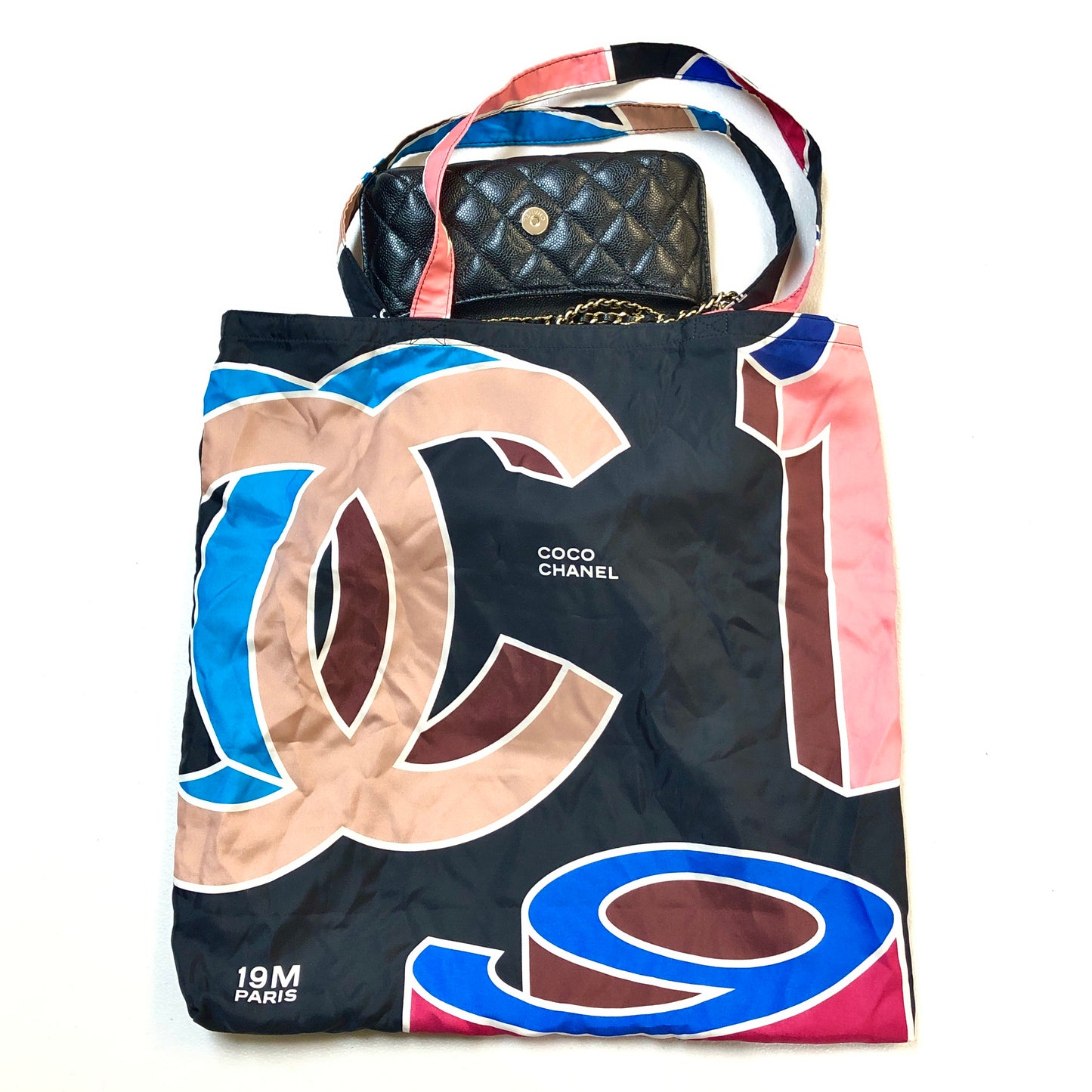 Chanel Foldable Tote Bag with Chain Quilted Caviar and Printed Nylon.