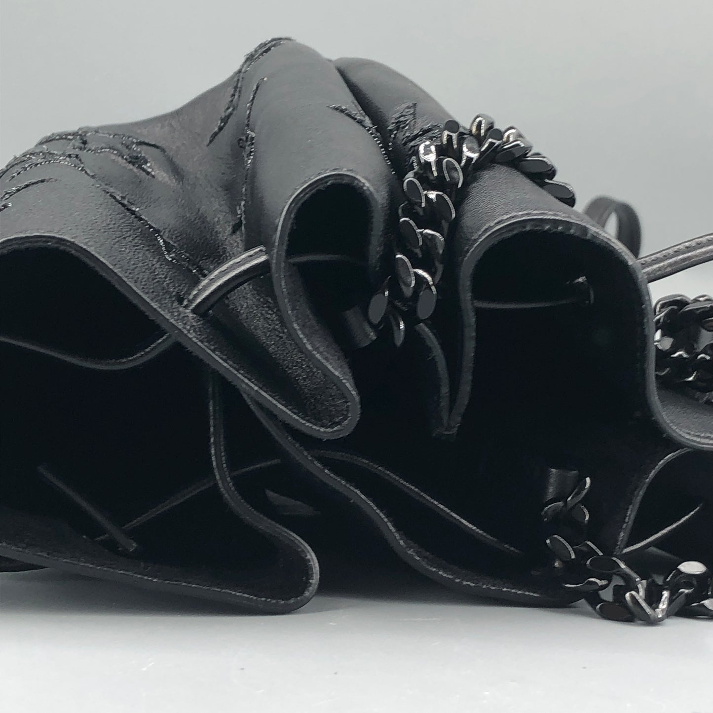 Saint Laurent Star Embossed Leather Mini Drawstring Bucket Bag Black