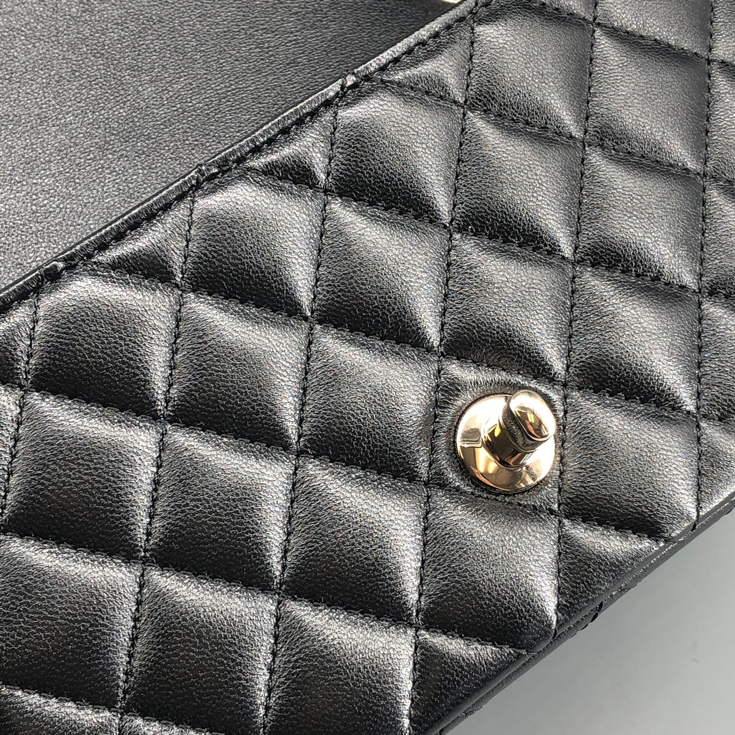 Chanel lambskin quilted mini rectangular flap bag in black with CC logo chain