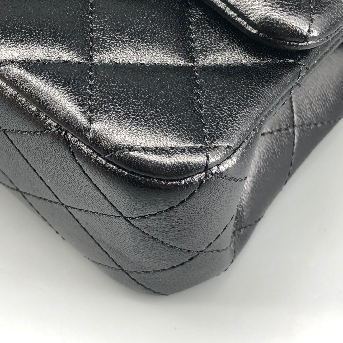 Chanel lambskin quilted mini rectangular flap bag in black with CC logo chain