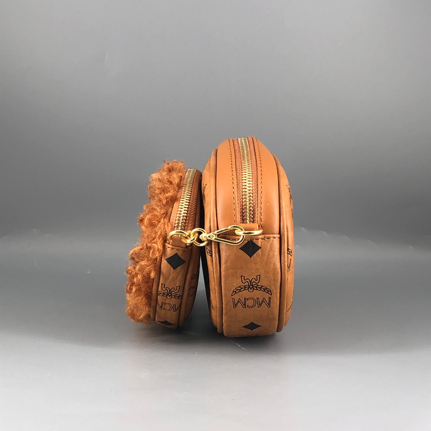 MCM Visetos Shearling Trim Oval Crossbody Camera Bag  Caramel