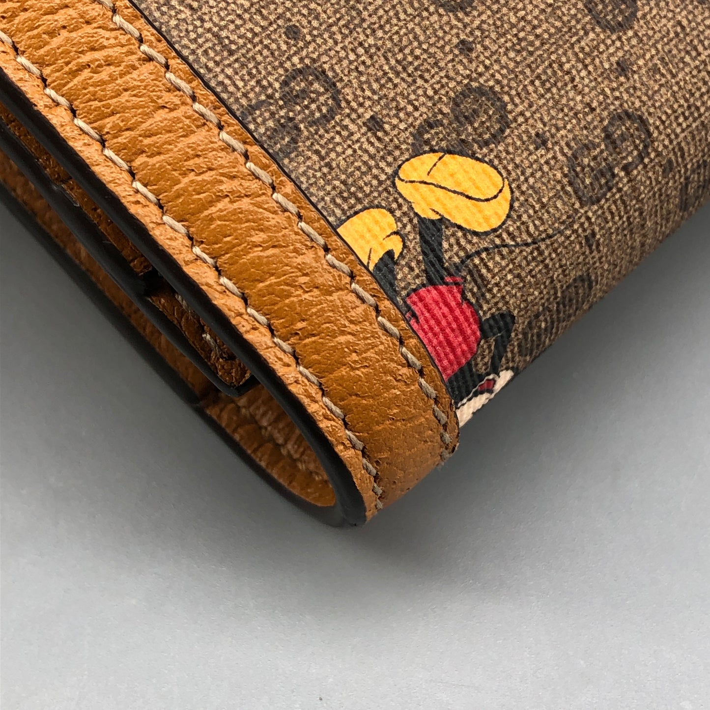 Gucci x Disney Mickey GG Supreme Flap Long Wallet yellow/beige